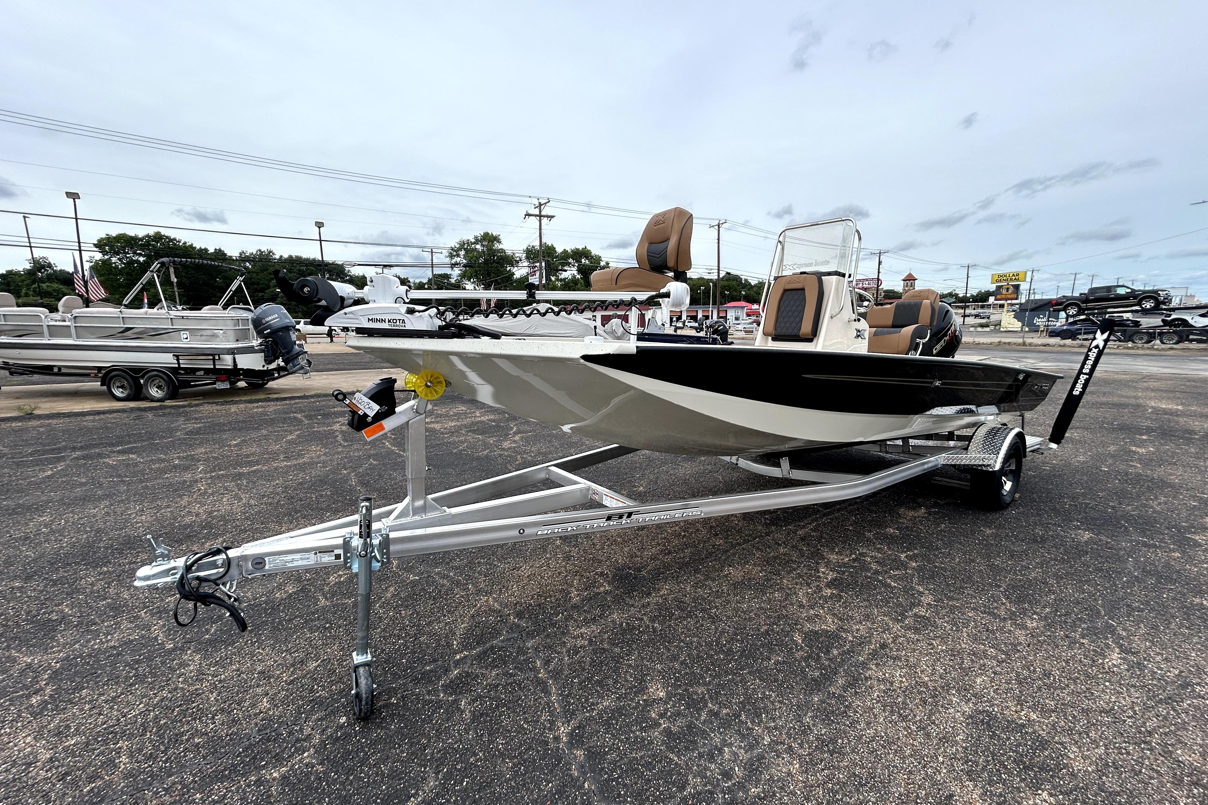 2026 Xpress H20B Bay boat on trailer, featuring sleek design and modern equipment.