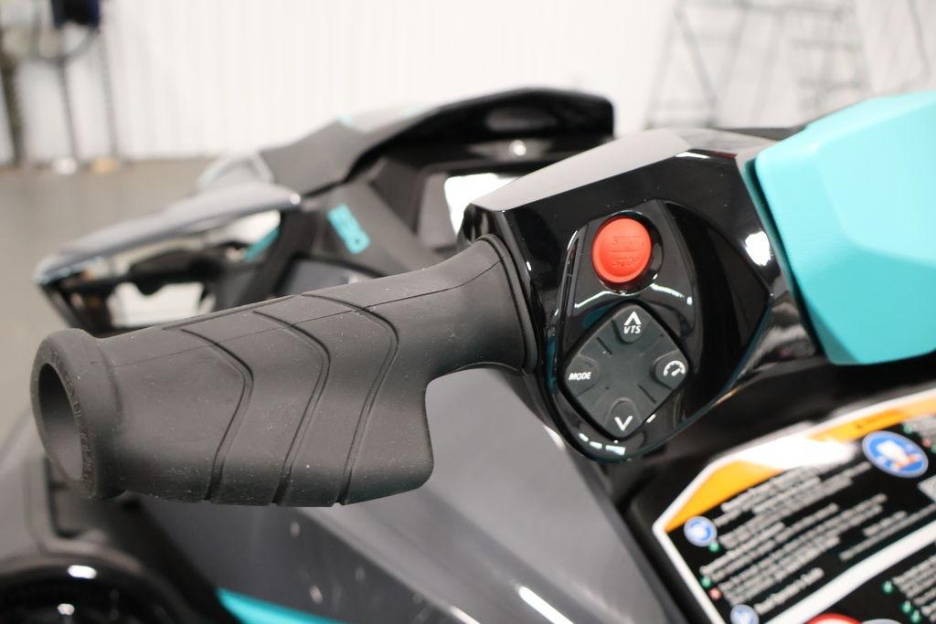 Close-up of 2026 Sea-Doo GTR 230 handlebar controls with buttons and grip.