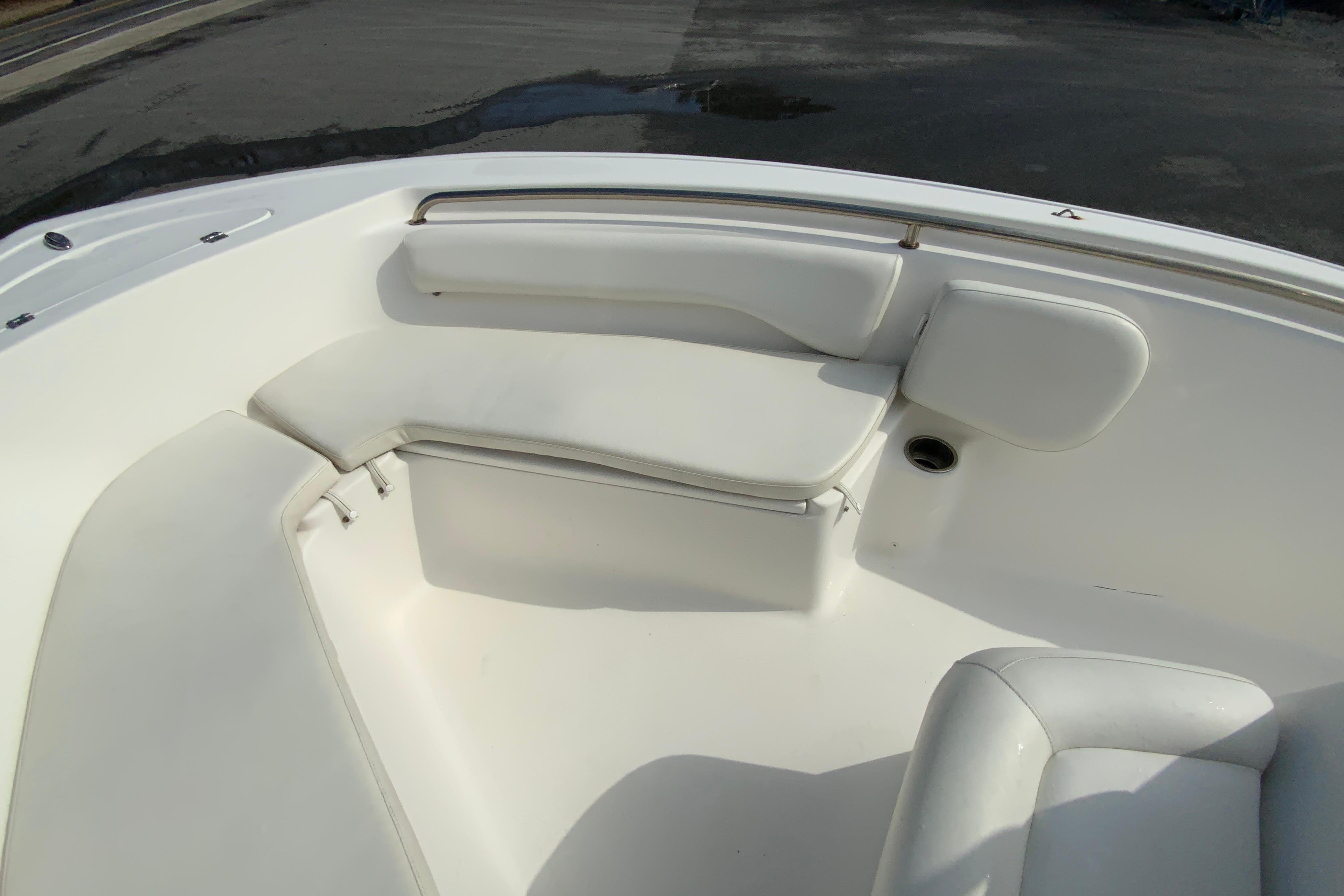 2017 Tidewater 198 CC Adventure boat interior with white cushioned seating.