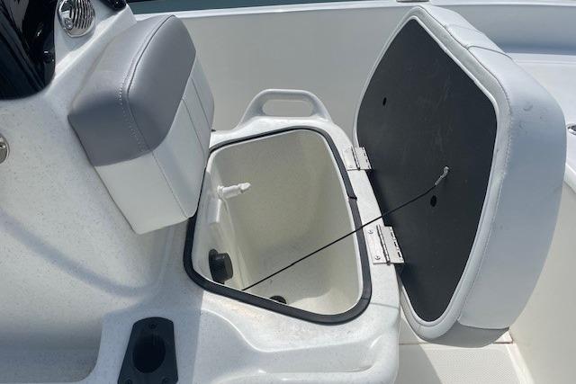 Open storage compartment on 2026 Mako Pro Skiff 17 CC boat.