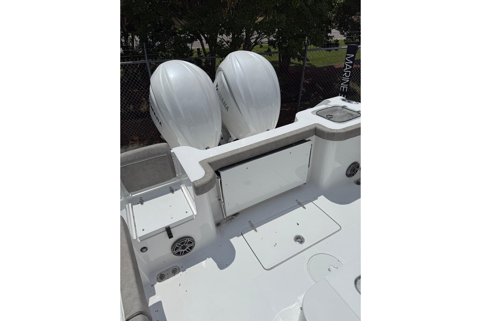 2026 Sea Hunt Gamefish 27 Coffin Box boat with dual Yamaha engines, spacious deck layout.