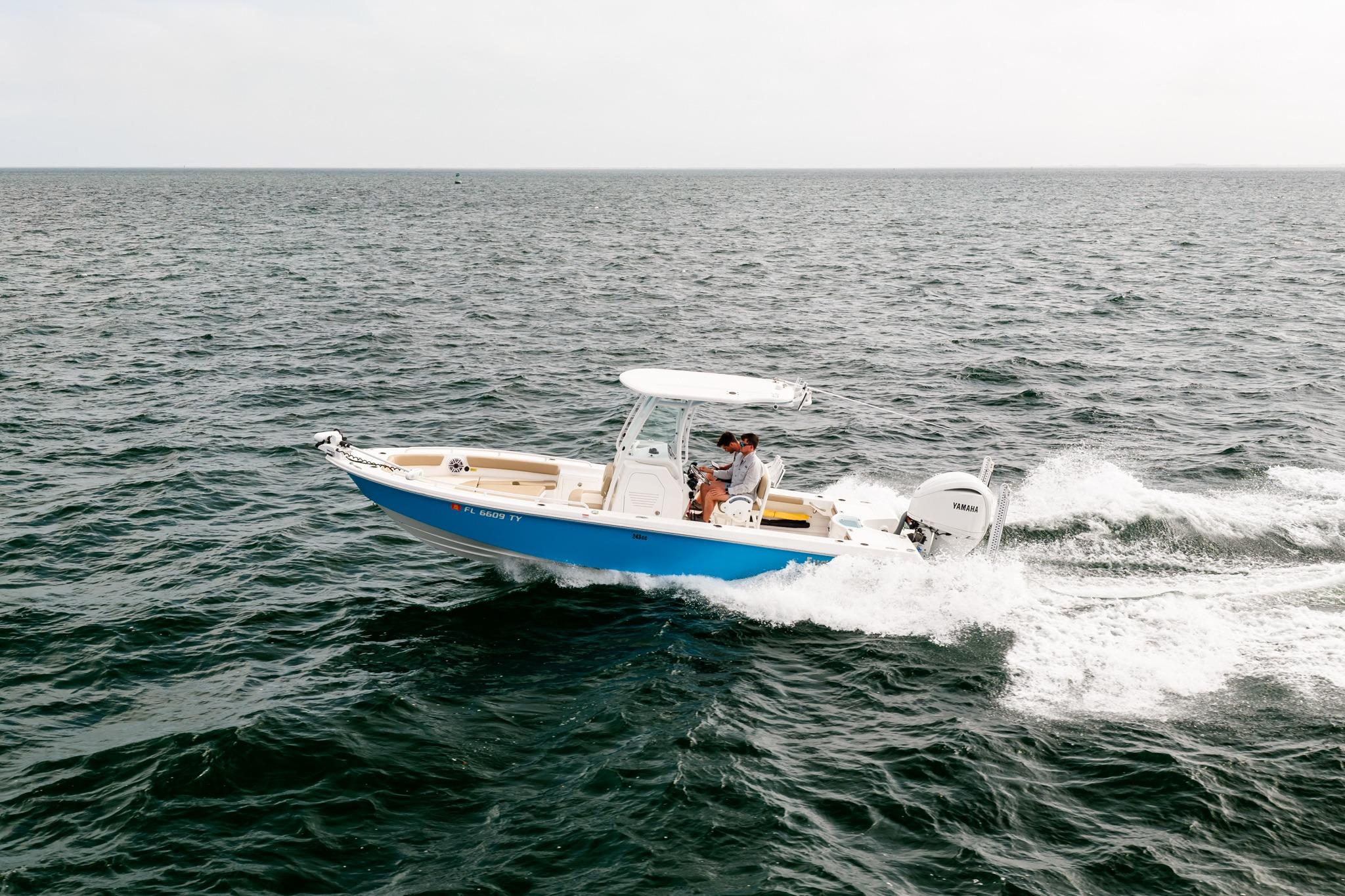 2023 Everglades 243 Center Console boat cruising on open water.