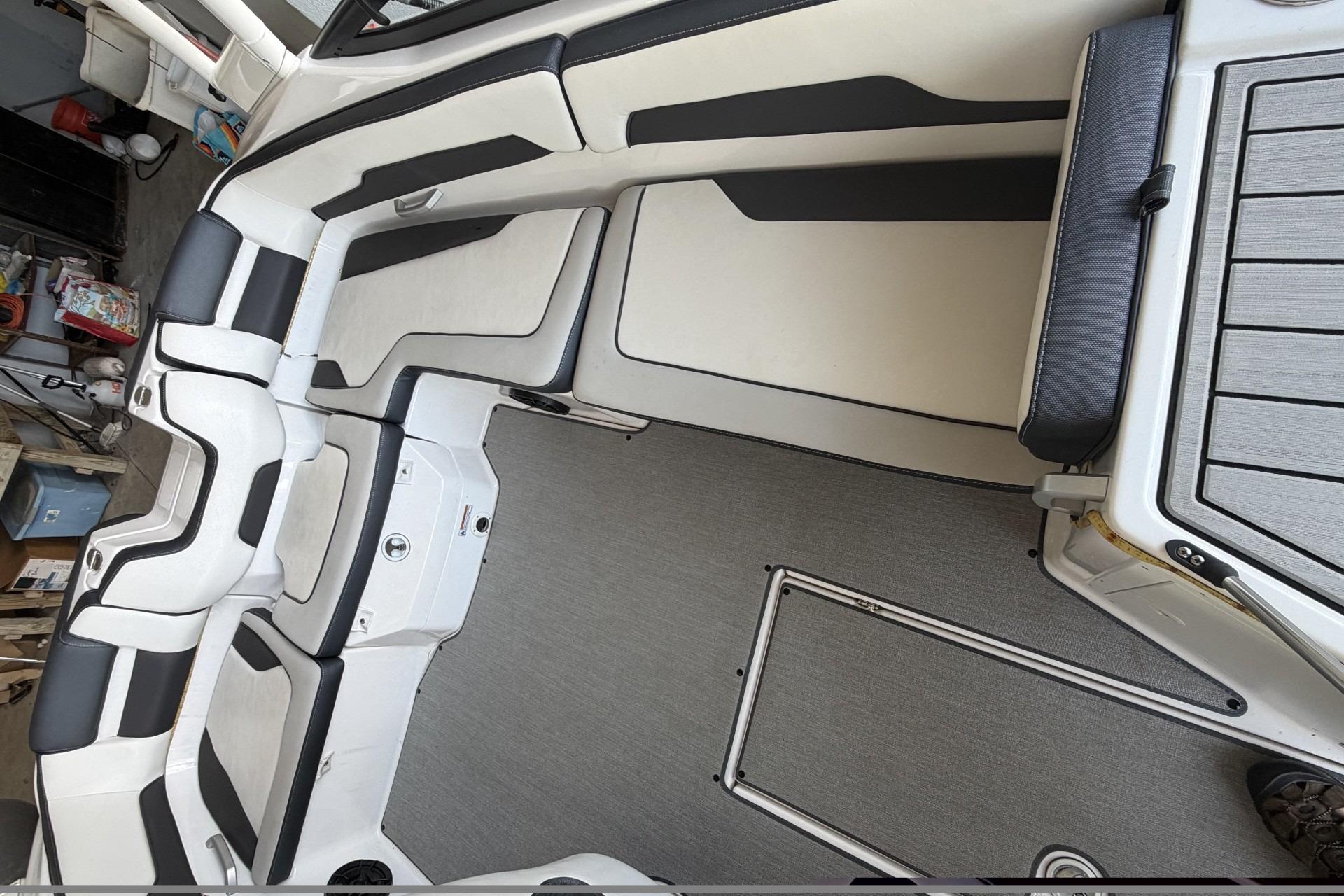 2022 Yamaha Boats AR195 interior with sleek seating and modern design.