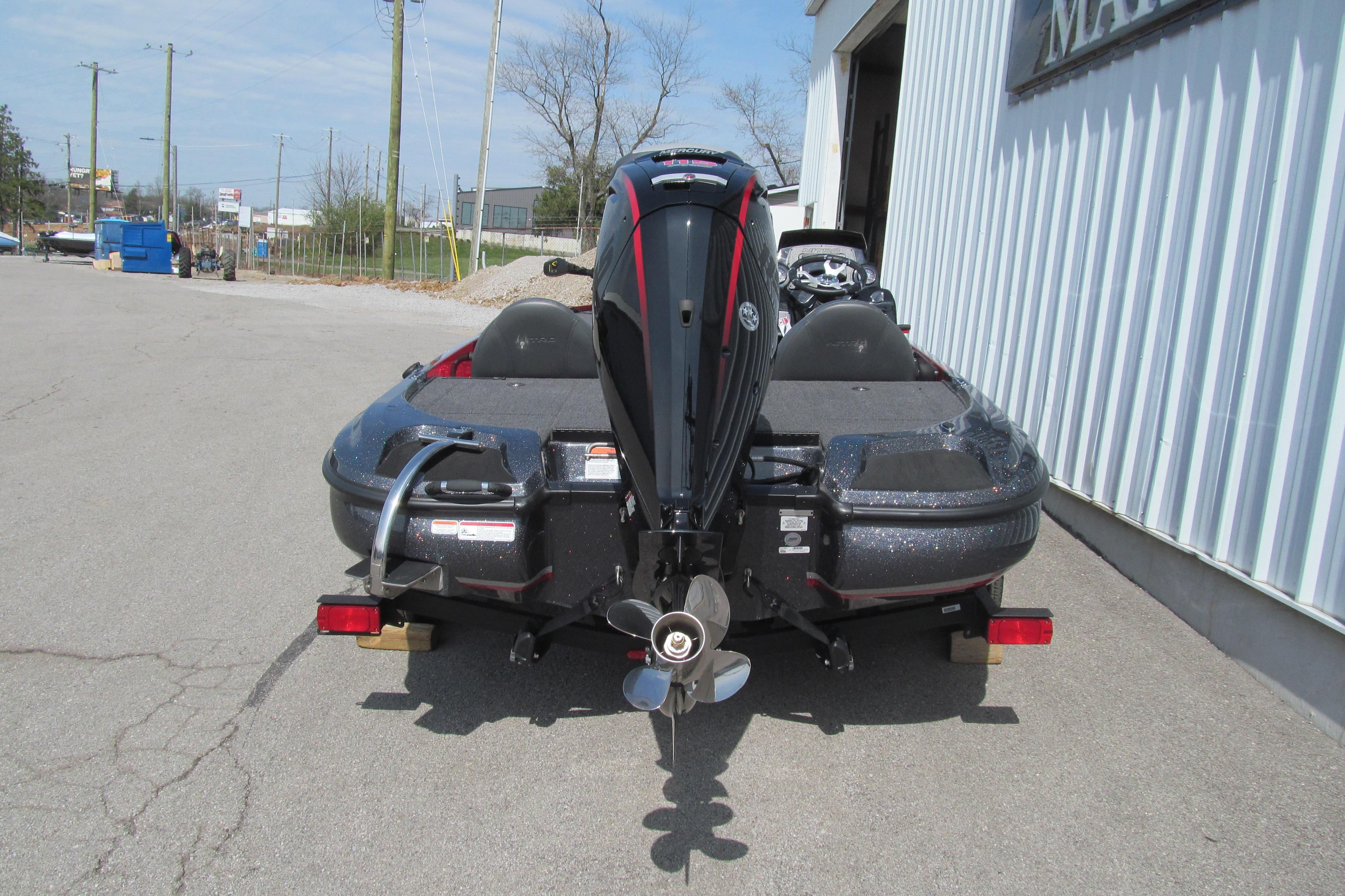 Rear view of a 2026 Nitro Z17 boat with an outboard motor.