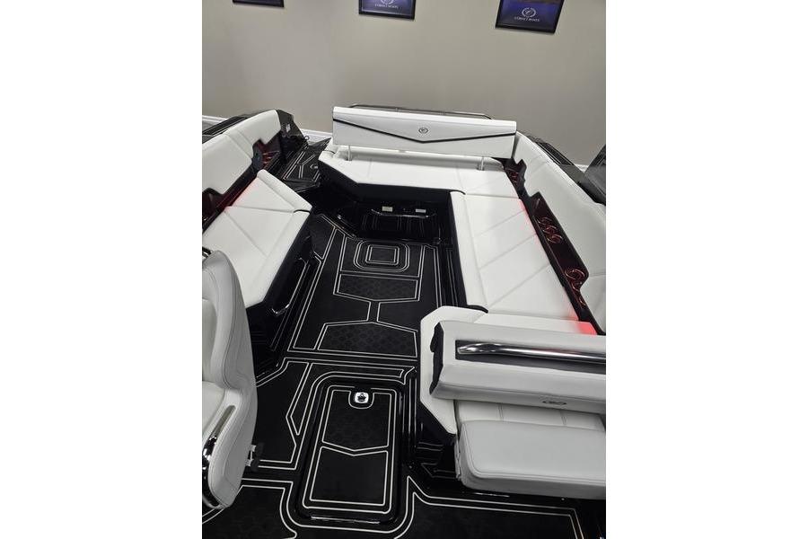2026 Cobalt R8 Surf boat interior with sleek white seating and modern design.