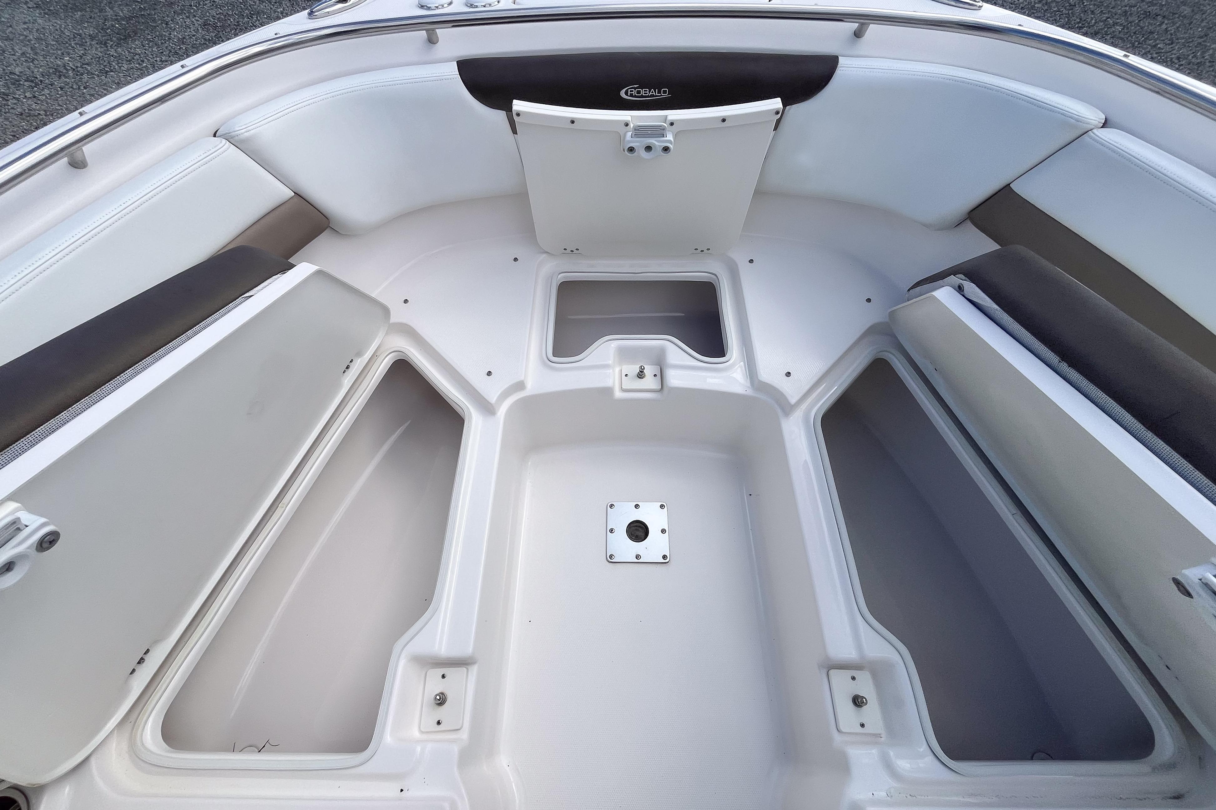 2020 Robalo R247 Dual Console boat interior with spacious seating and storage compartments.