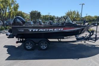 2026 Tracker Targa V-18 WT boat on trailer in parking lot.