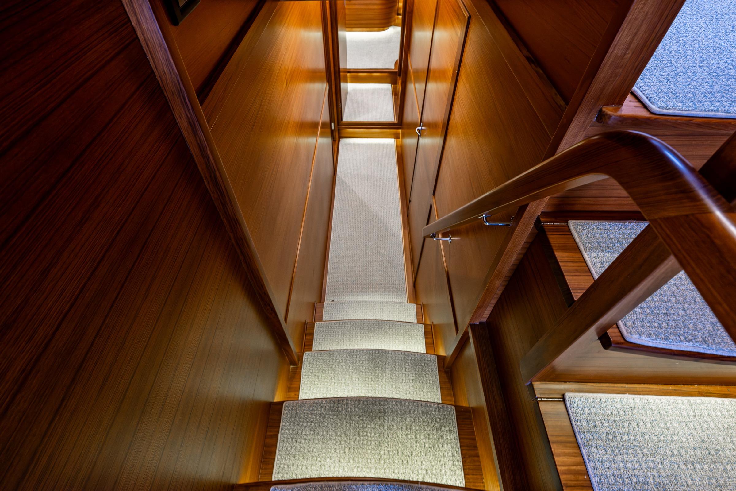 Staircase inside Fleming 55 Pilothouse yacht, year 2027.