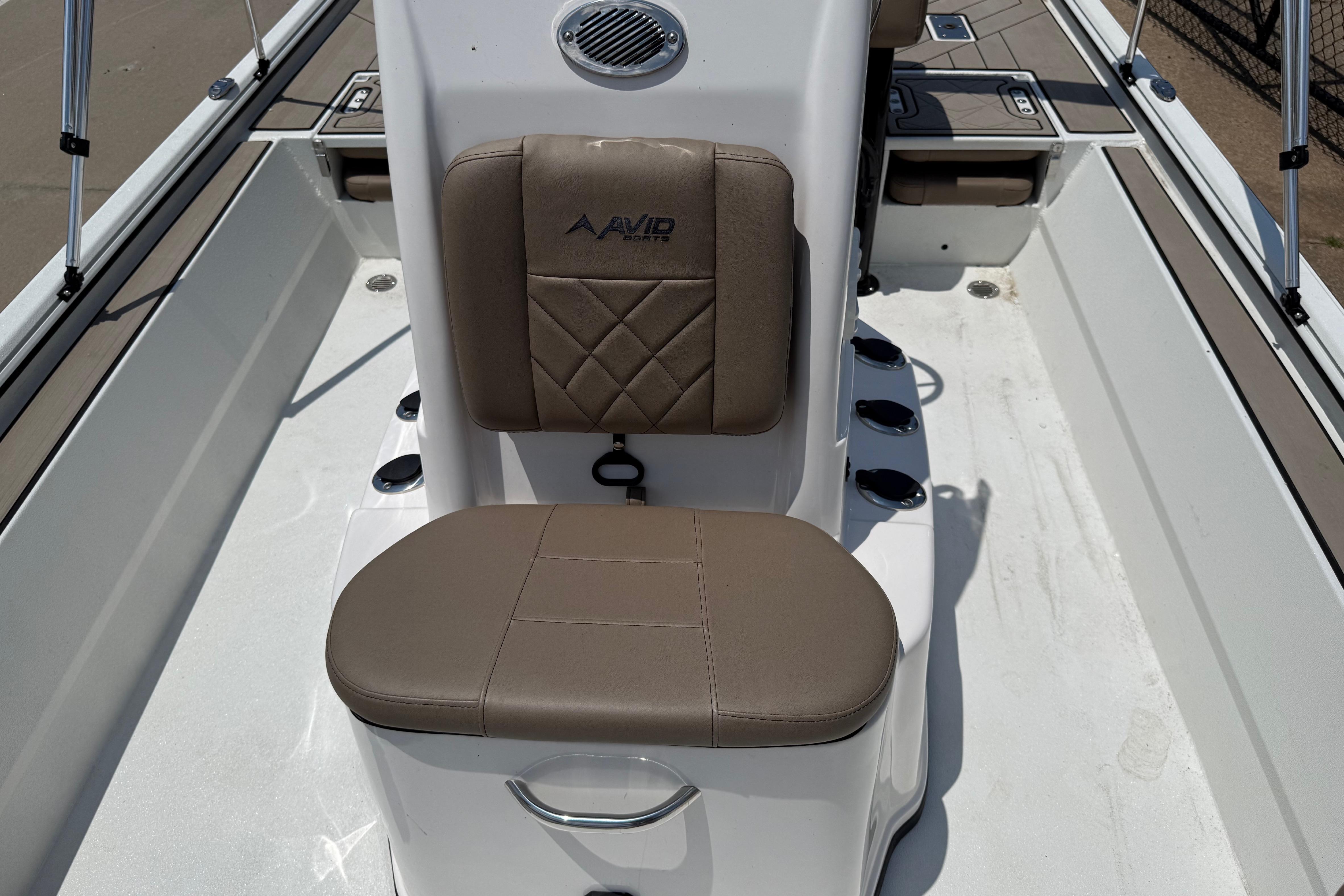 Avid 22 Recon 2025 boat interior with cushioned seating and rod holders.