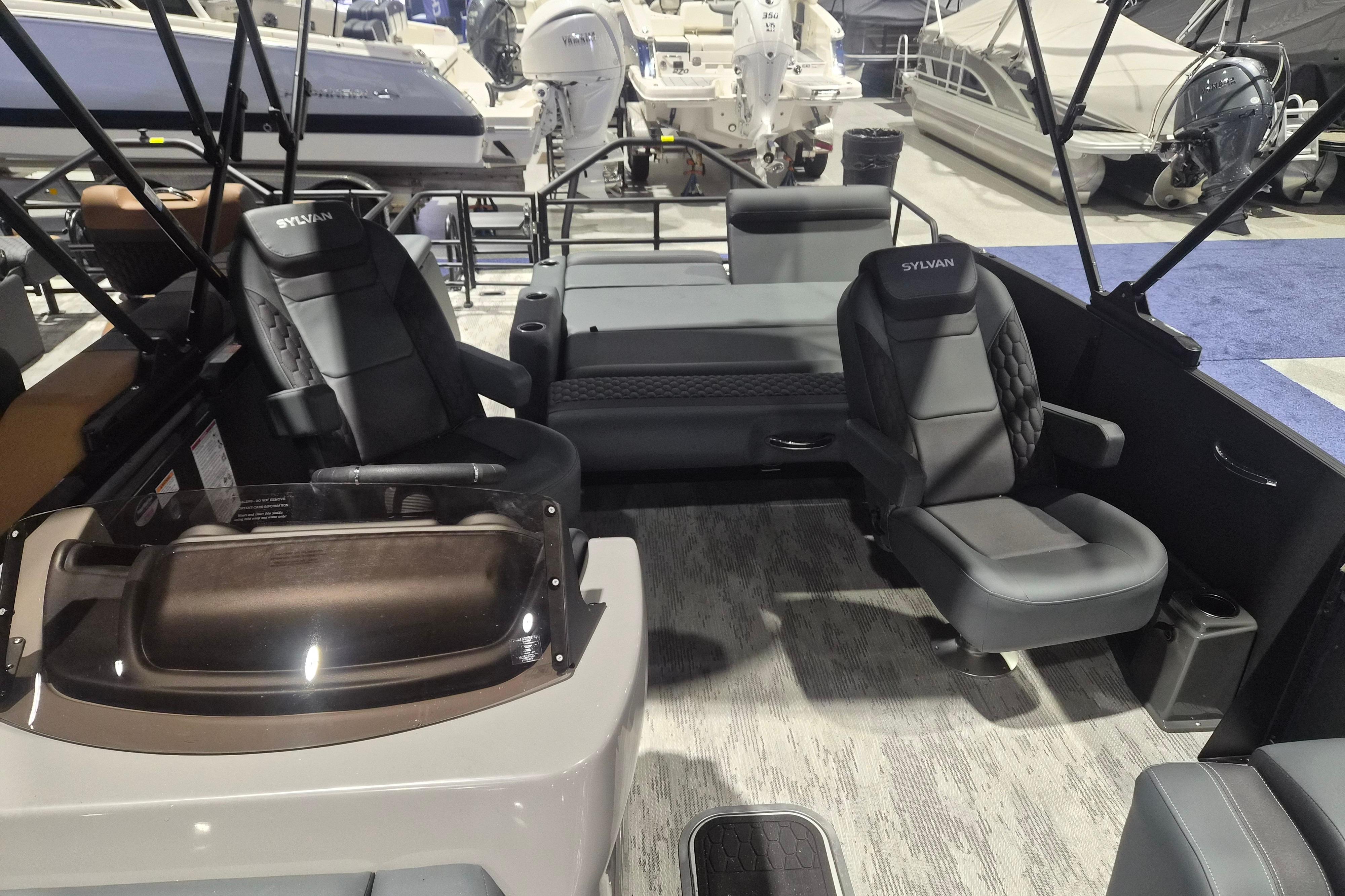 Interior of 2026 Sylvan L3 ULZ boat with modern seating and sleek design.