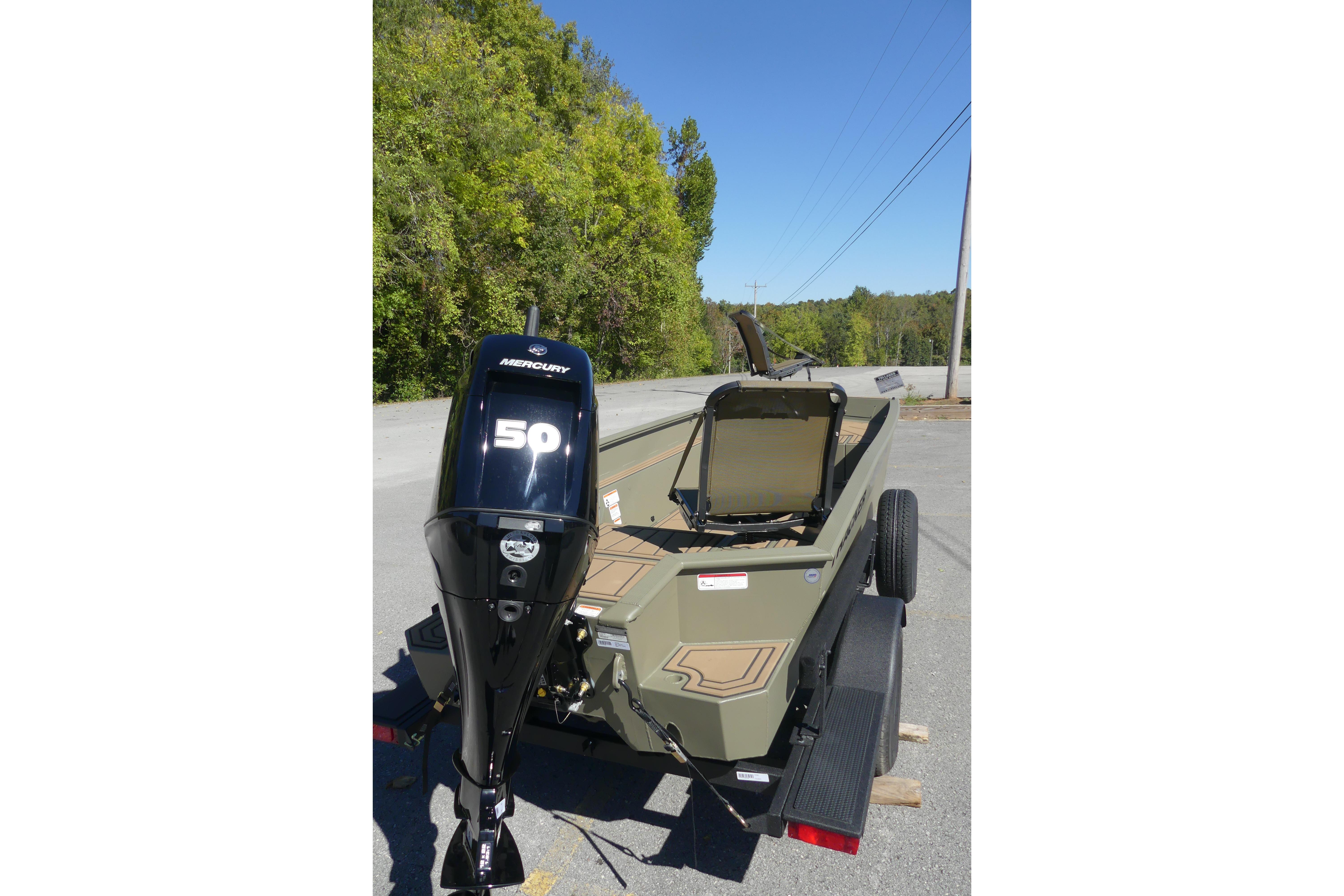 2026 Tracker Grizzly 1650 T Prairie Wings Edition boat with Mercury 50 outboard motor.
