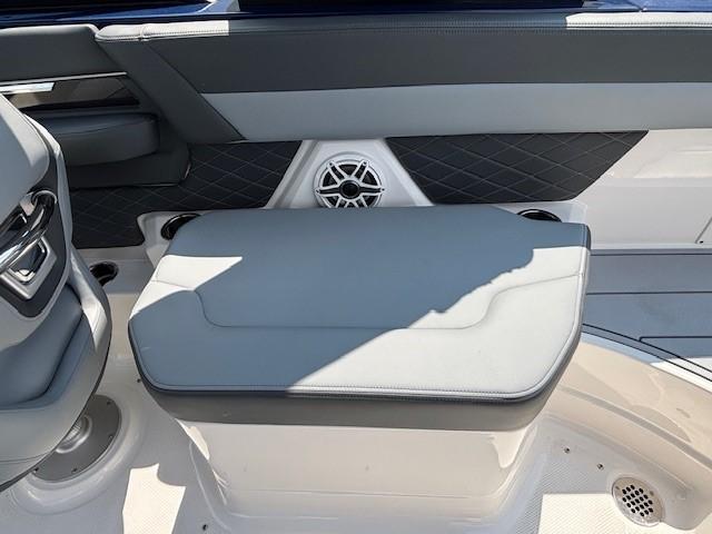 2026 Chaparral SSX 6 boat interior with cushioned seating and speaker detail.