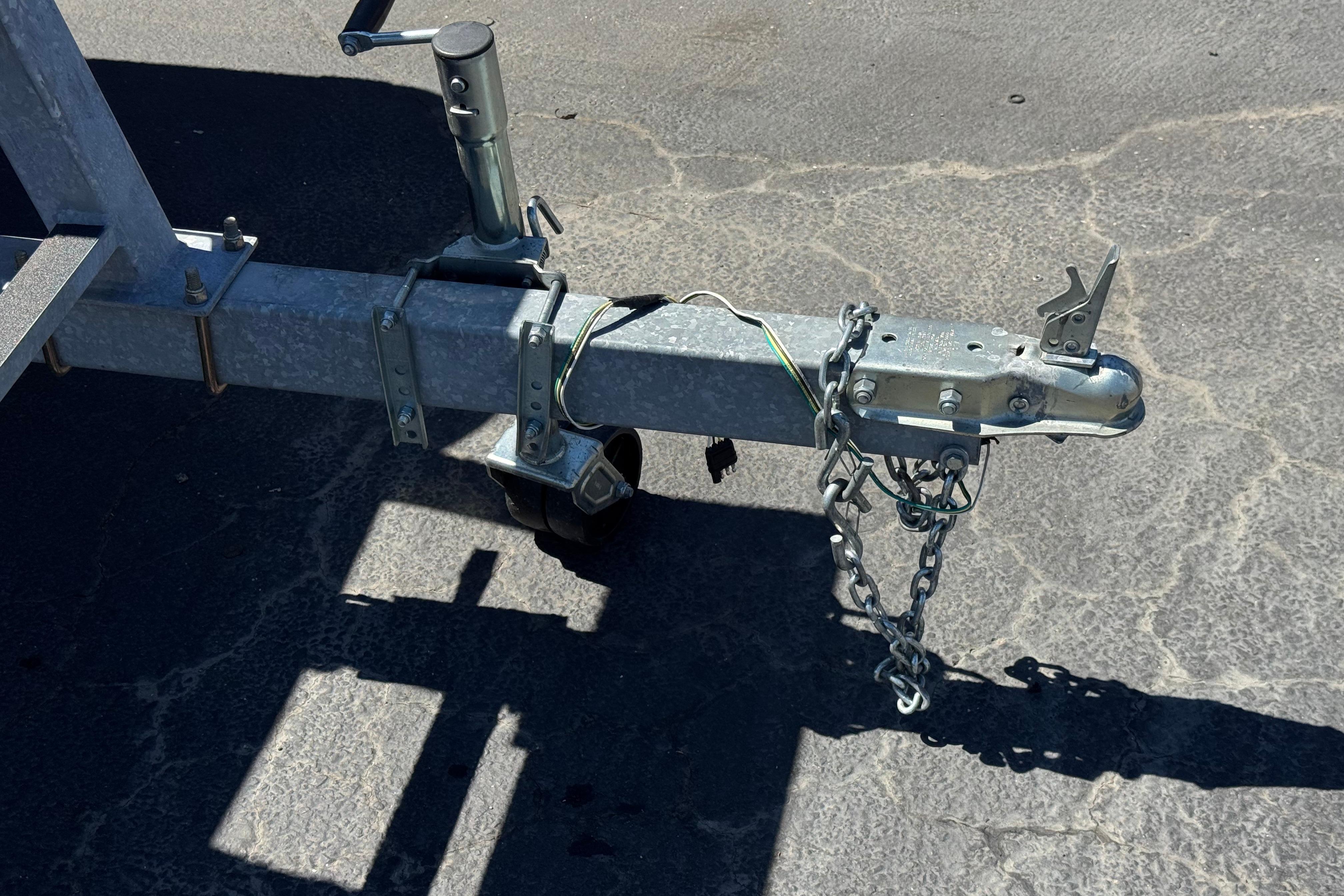 Trailer hitch and chains for 2023 Avalon Venture Fish N Cruise boat.