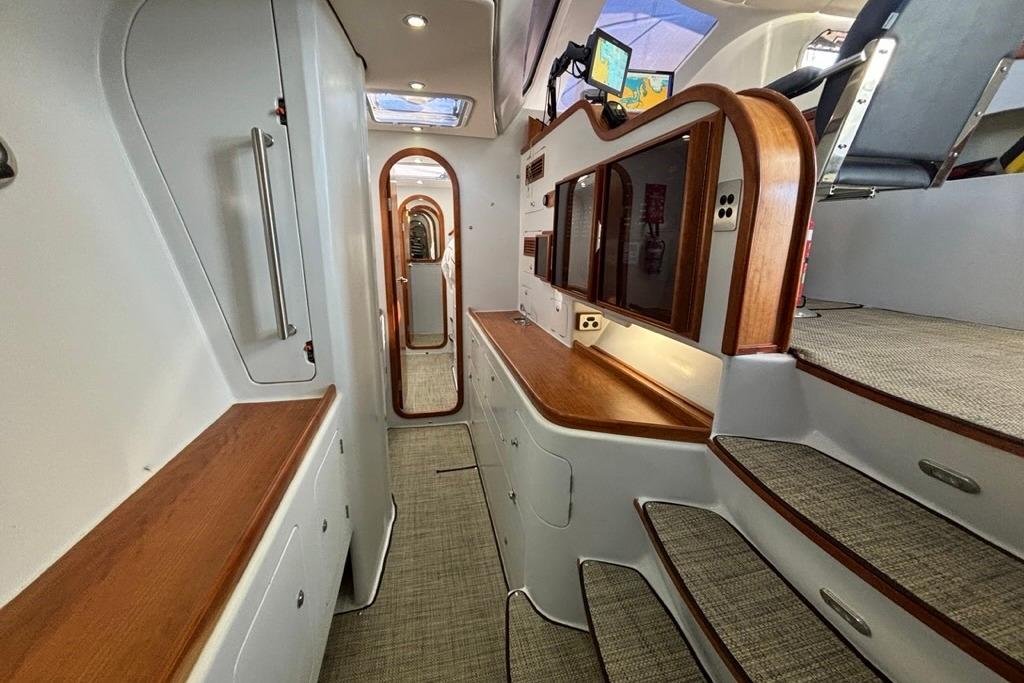 Interior of 2022 Spirited 480 Custom yacht with modern design and wooden accents.