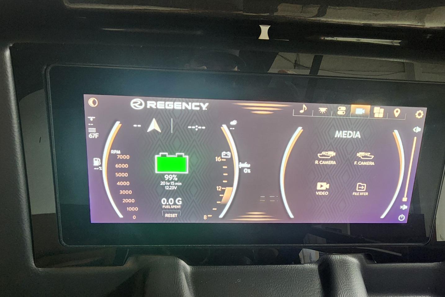 Dashboard display of a 2026 Regency 250 DL showing battery status and media options.