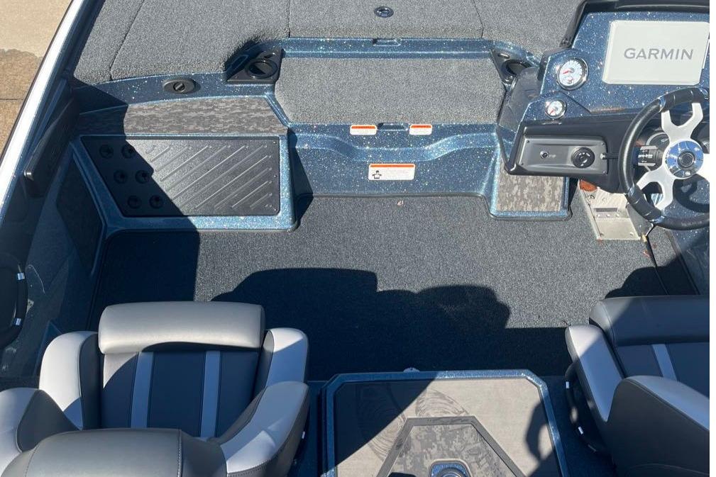 Interior of 2025 Nitro Z20 XL Pro boat with Garmin dashboard and seating.