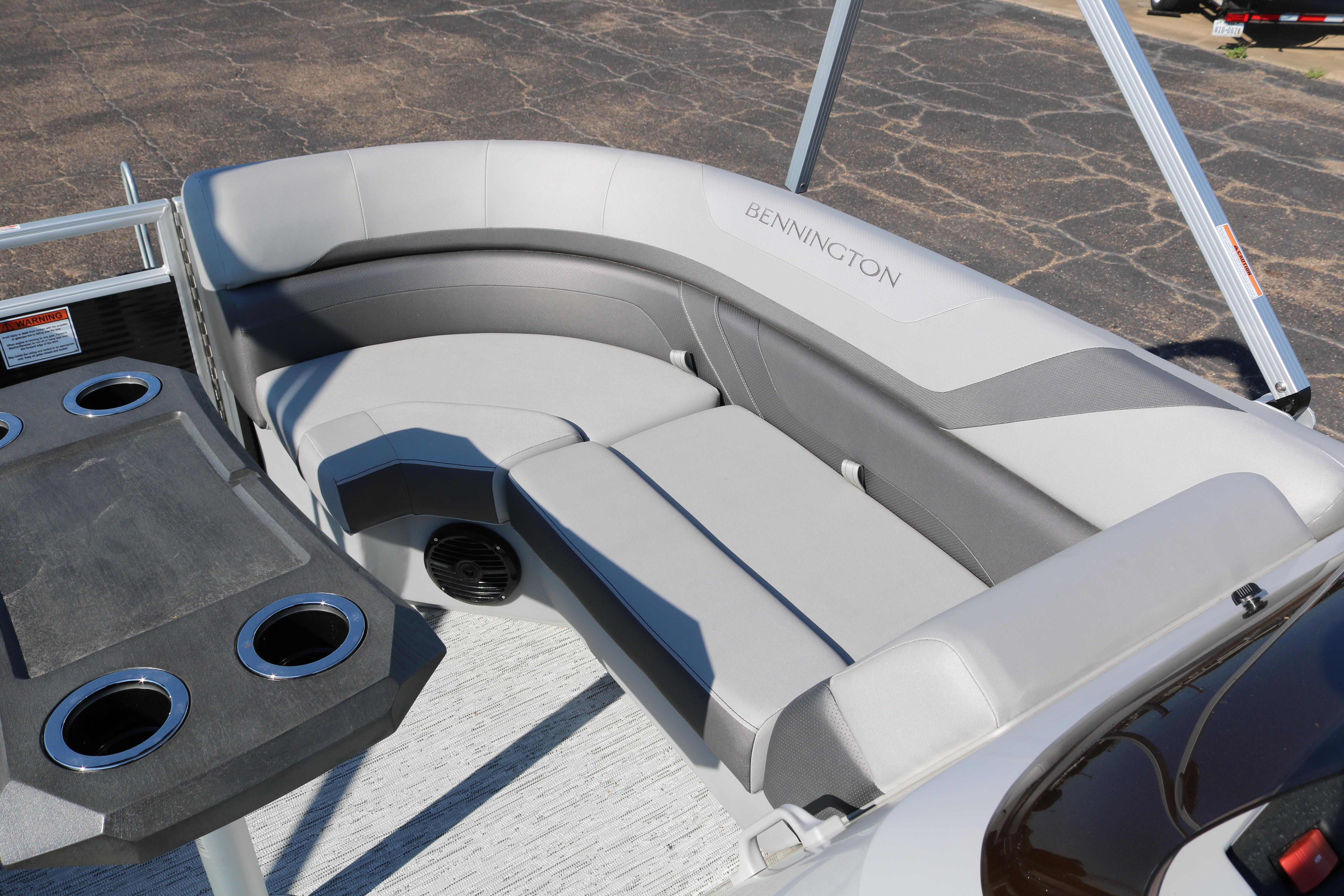 2026 Bennington 22SX Stern Radius boat interior with gray seating and cup holders.
