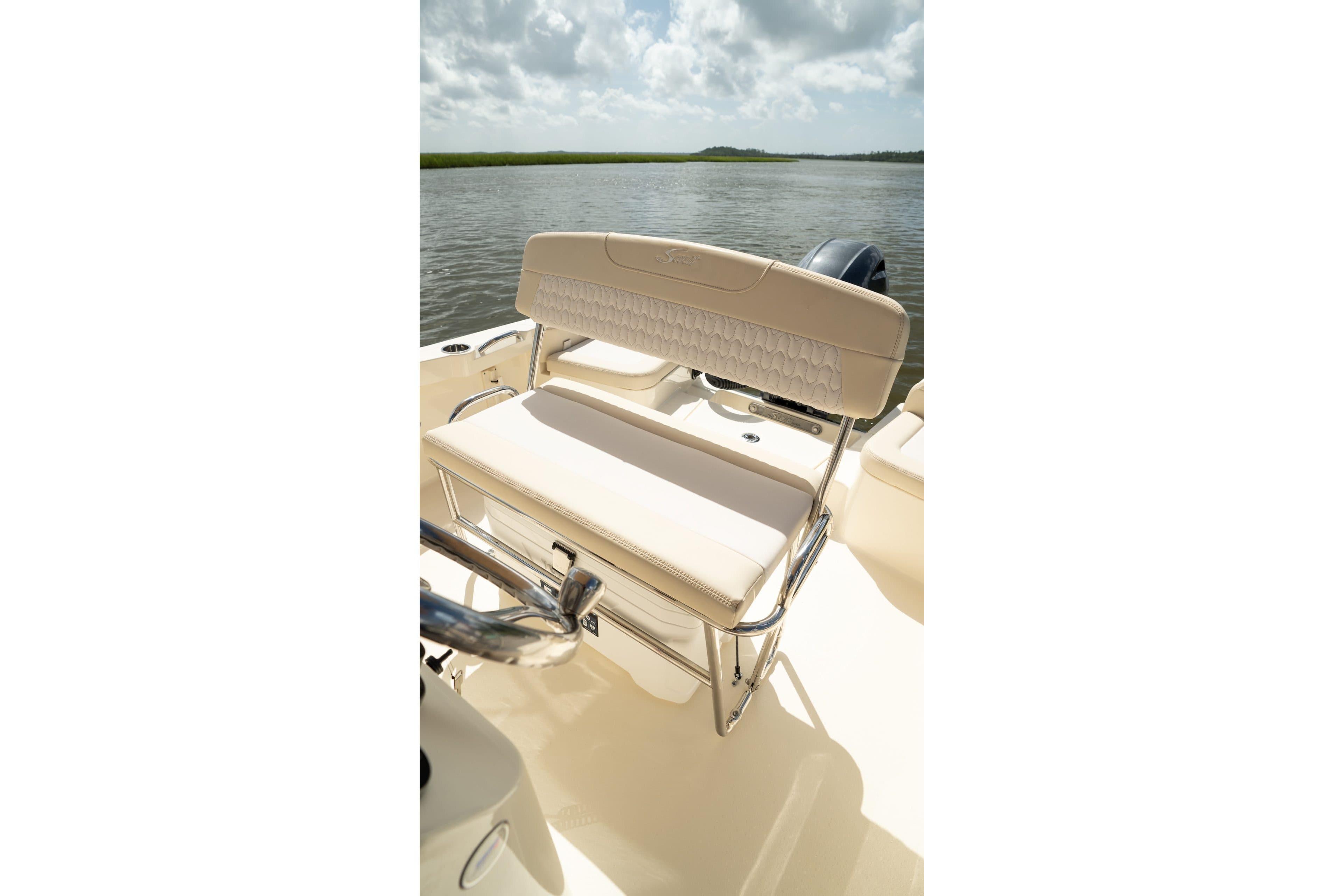 2026 Scout 188 Sportfish boat seat with elegant design on calm water.