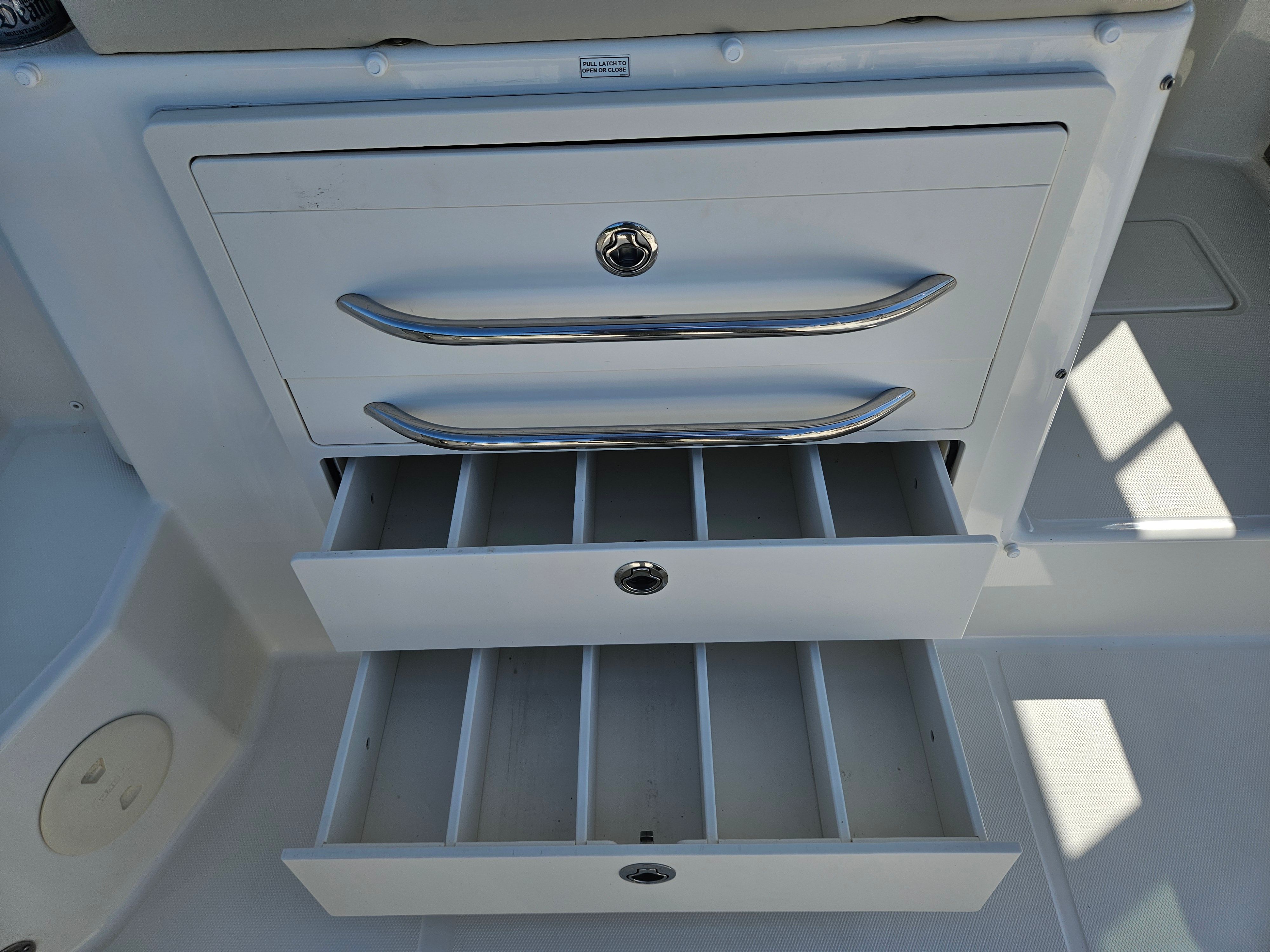 Drawers in the cockpit of the 2023 Boston Whaler 325 Conquest.