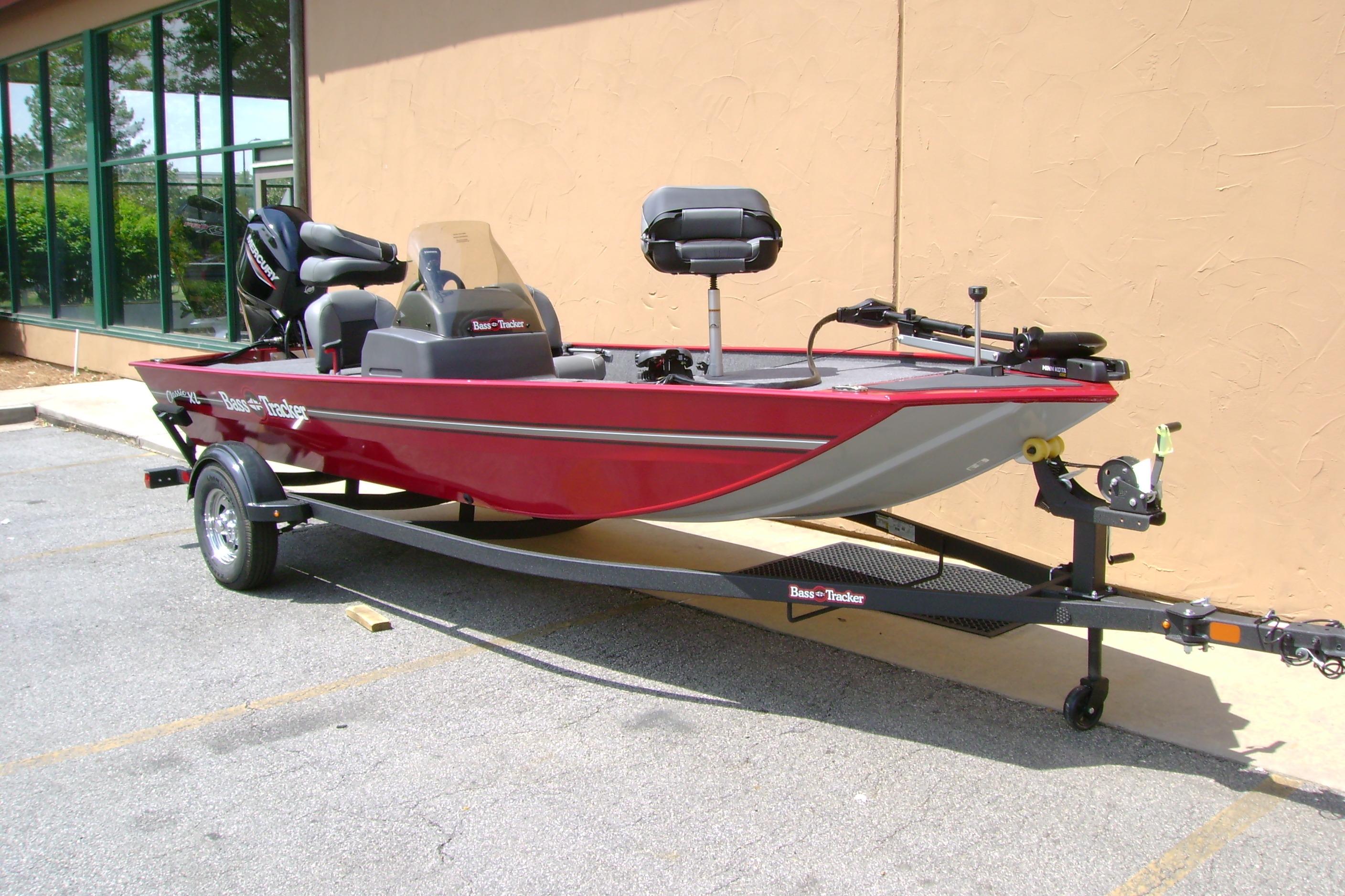 2026 Tracker Bass Tracker Classic XL boat on trailer, parked outdoors.