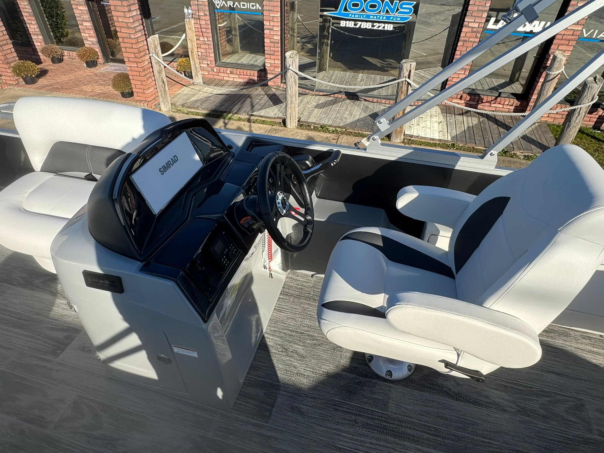 Interior of 2026 Landau 23C Atlantis with steering console.