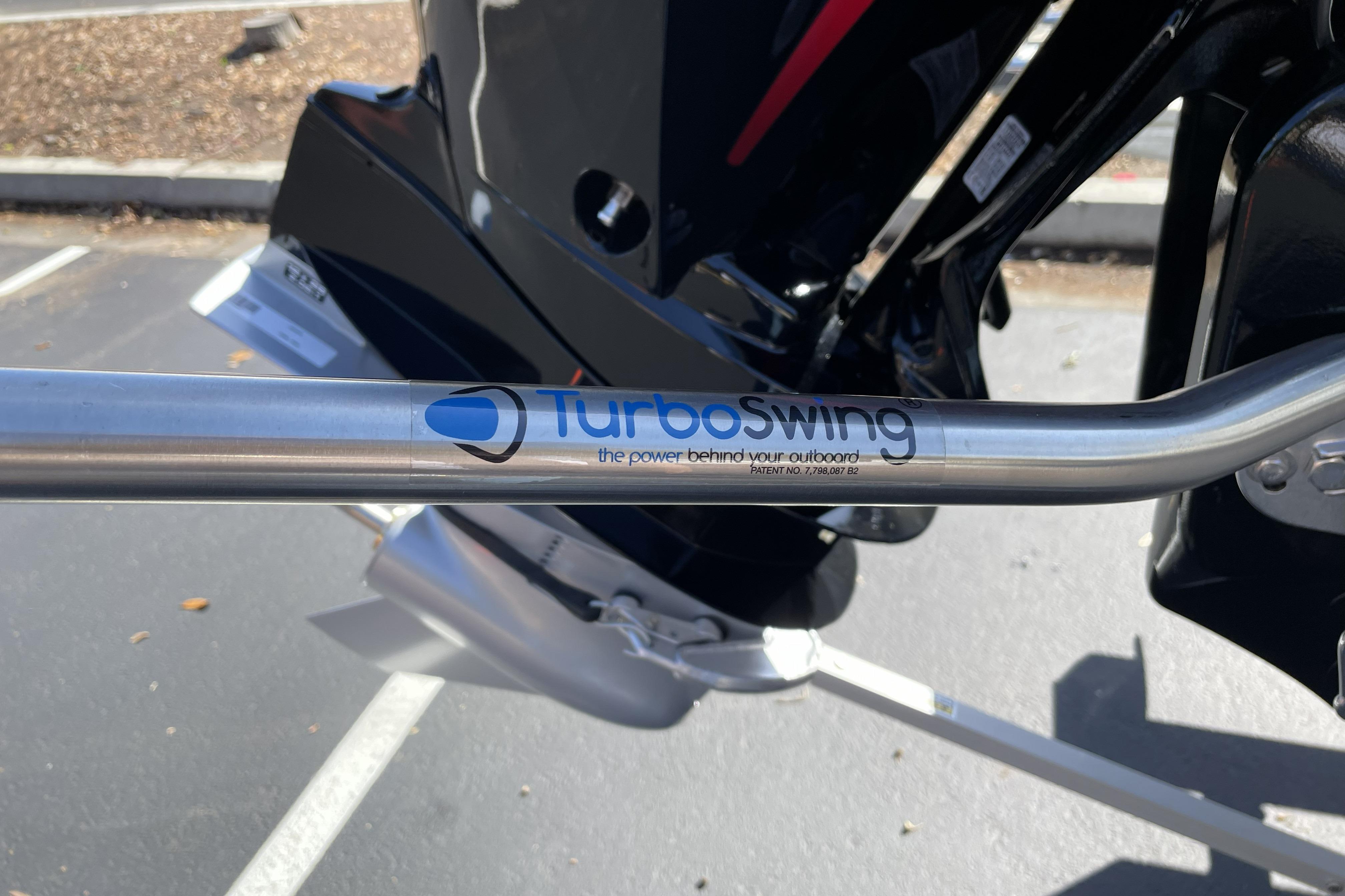 Turboswing bar on a 2026 Mako Pro Skiff 19 CC boat, parked outdoors.