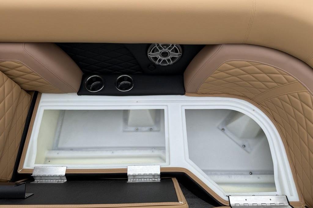 Luxurious seating and storage in 2026 Godfrey Monaco 235 SFLC iMPACT boat interior.