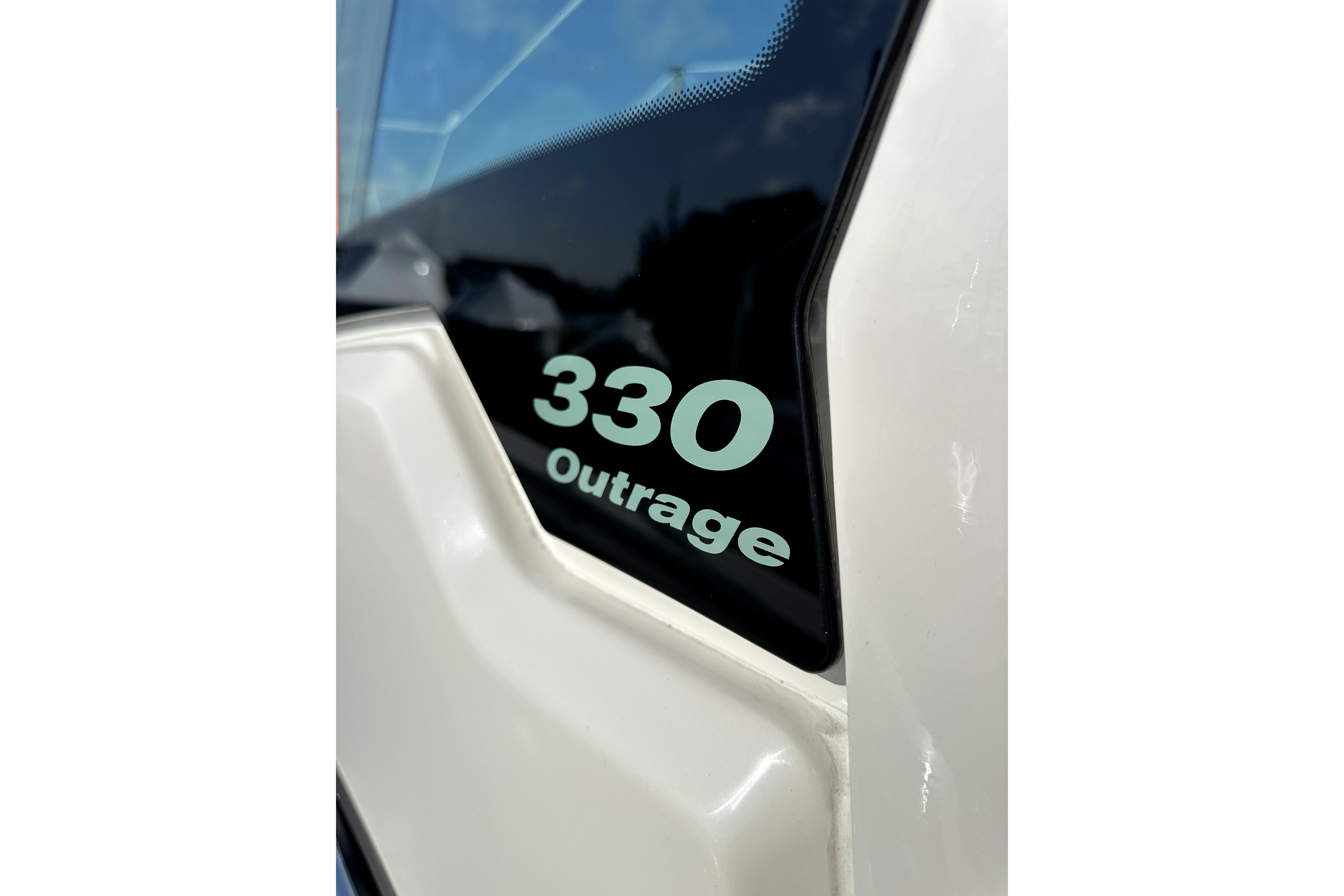 2023 Boston Whaler OUTRAGE 330 boat model detail with sleek design.