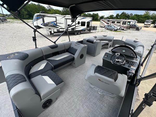 2024 Massimo Marine P-21R pontoon boat interior with luxurious seating and modern dashboard.