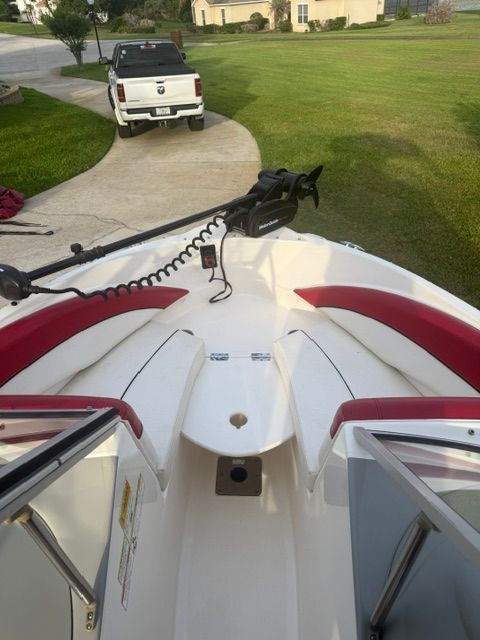 Bayliner 184 SF 2012 parked on a driveway.