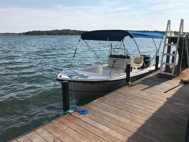 Mako 171 Center Console boat docked, 2006 model.