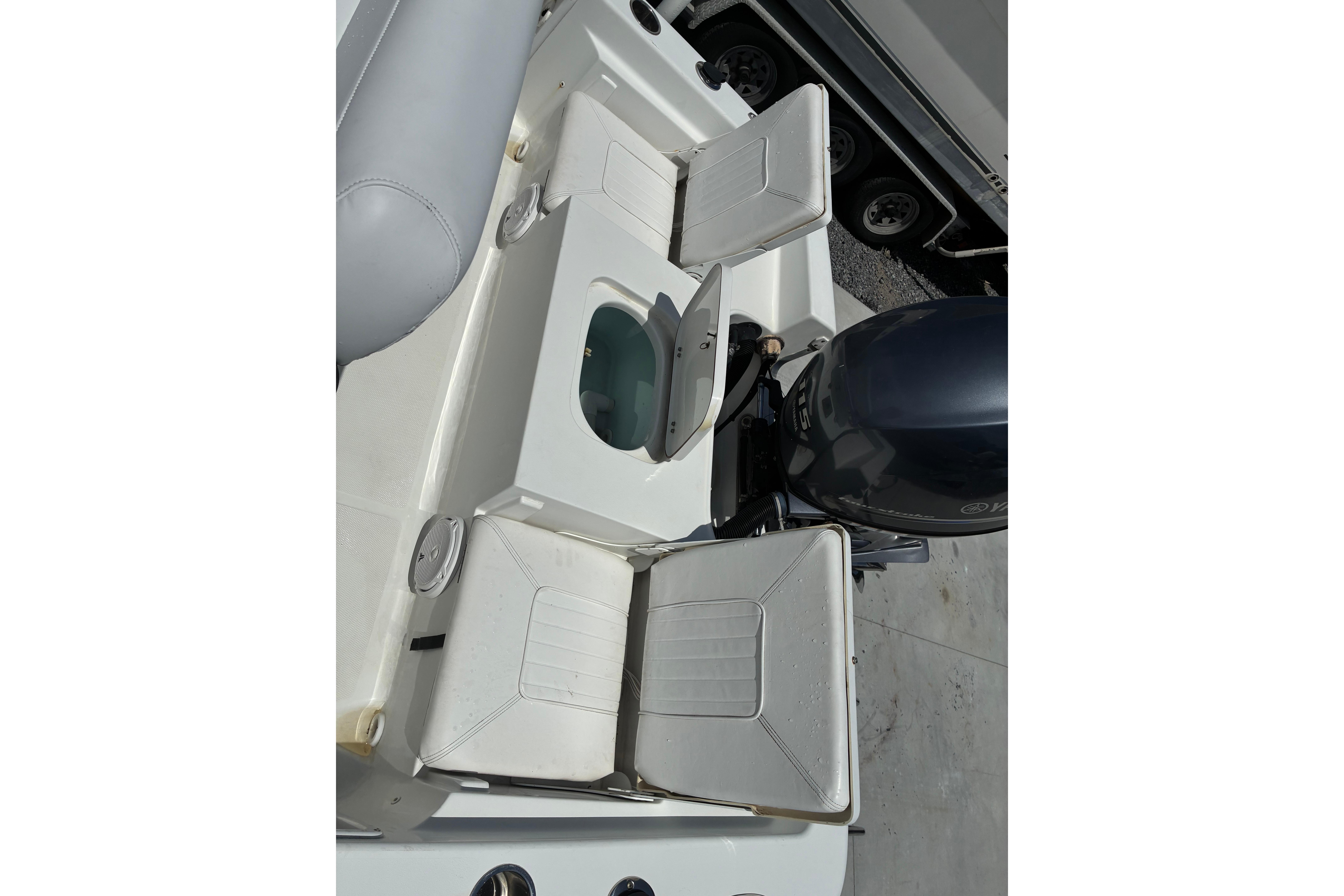 2014 Sea Hunt BX 20 BR boat interior with seating and motor view.