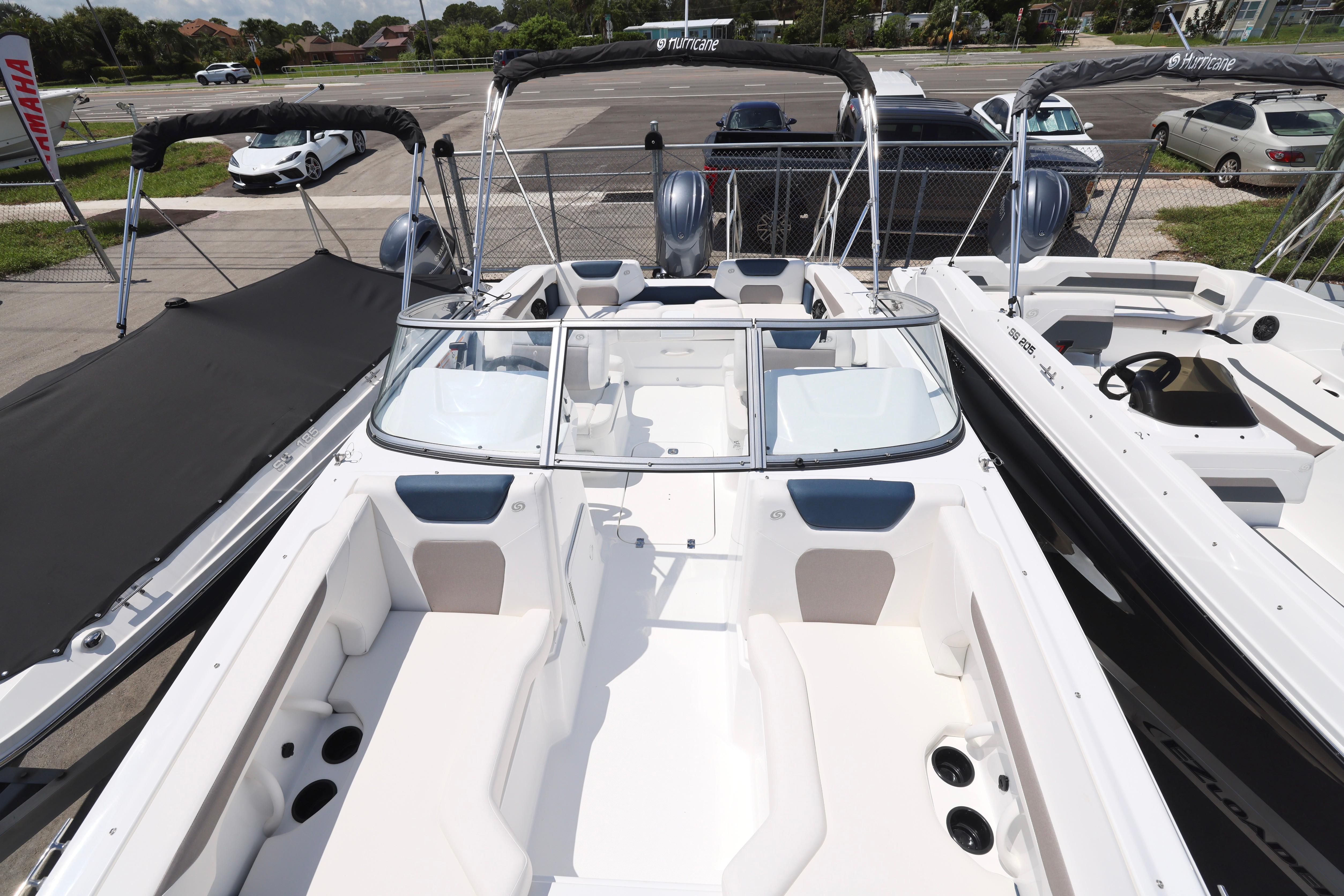 2026 Hurricane SunDeck 2050 OB boat with spacious seating and sleek design.