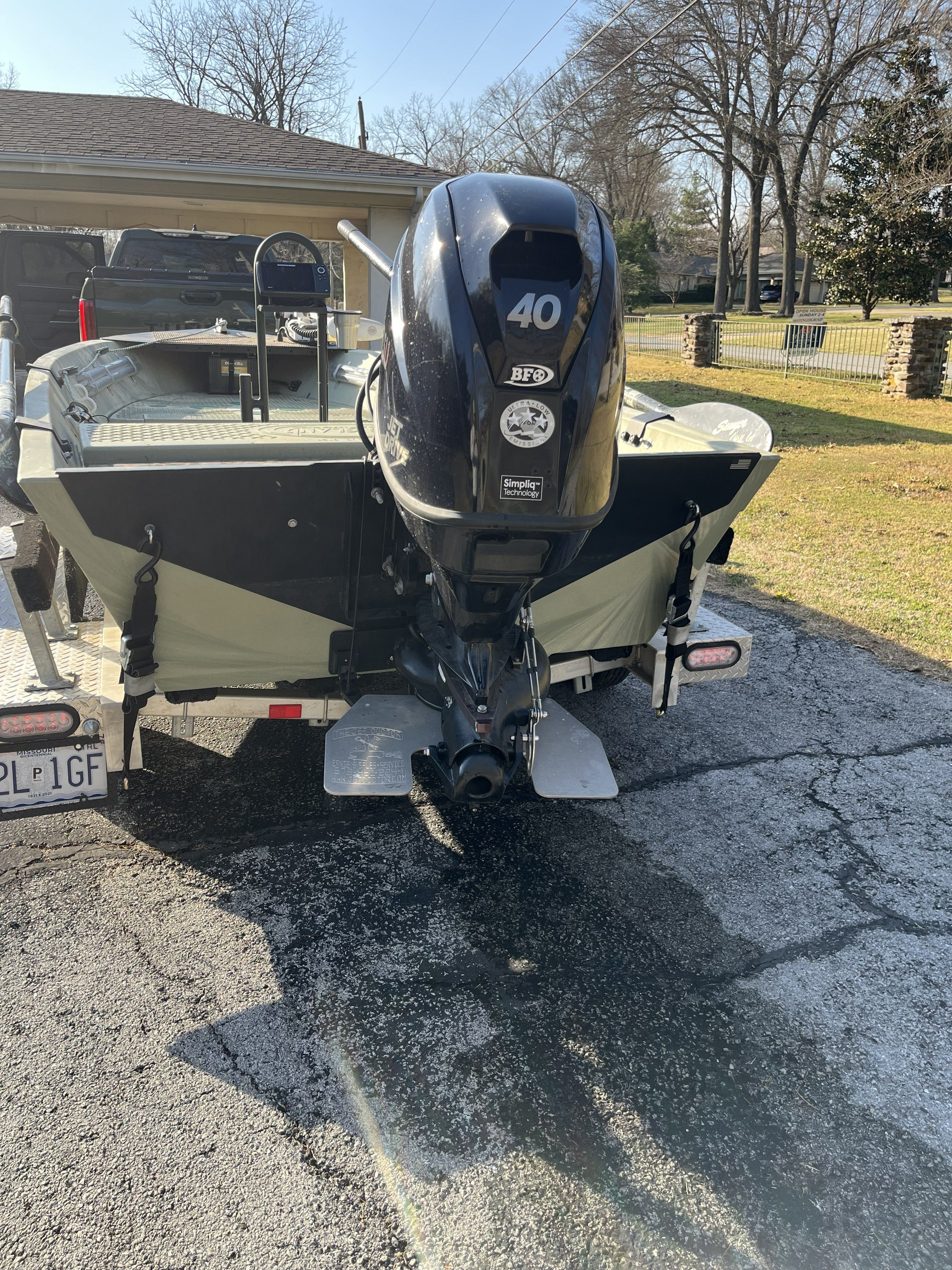 A 2020 Hog Island Boat Works SW 16 with a 40 HP motor on a trailer.