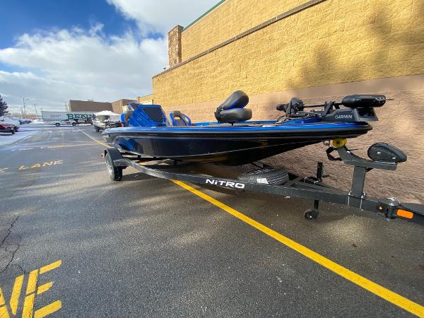 2025 Nitro Z18 Pro boat on trailer in parking lot.