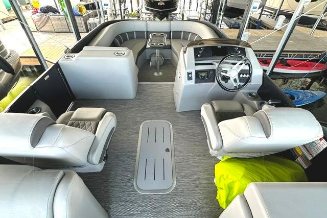 2021 Bennington L Bowrider 25 Quad Bench interior with luxurious seating and modern helm.