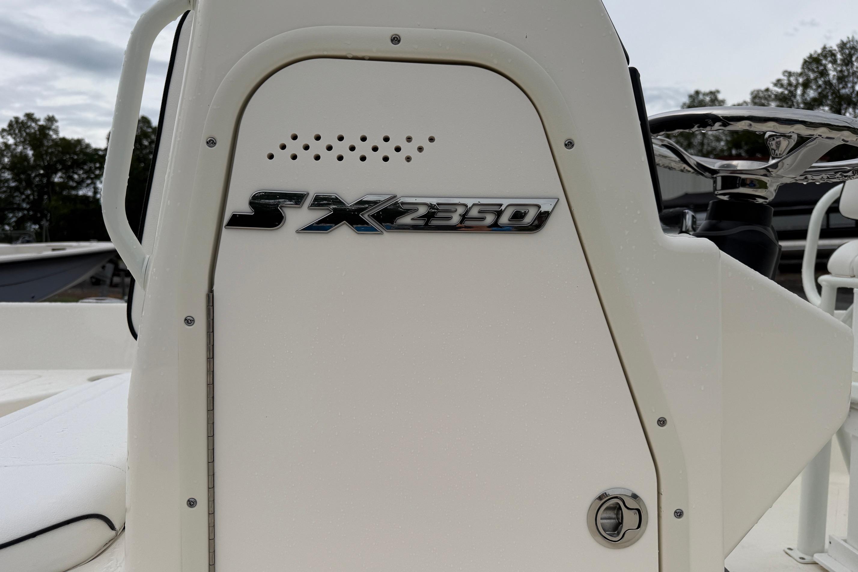 2026 Skeeter SX2350 boat console with logo and steering wheel detail.