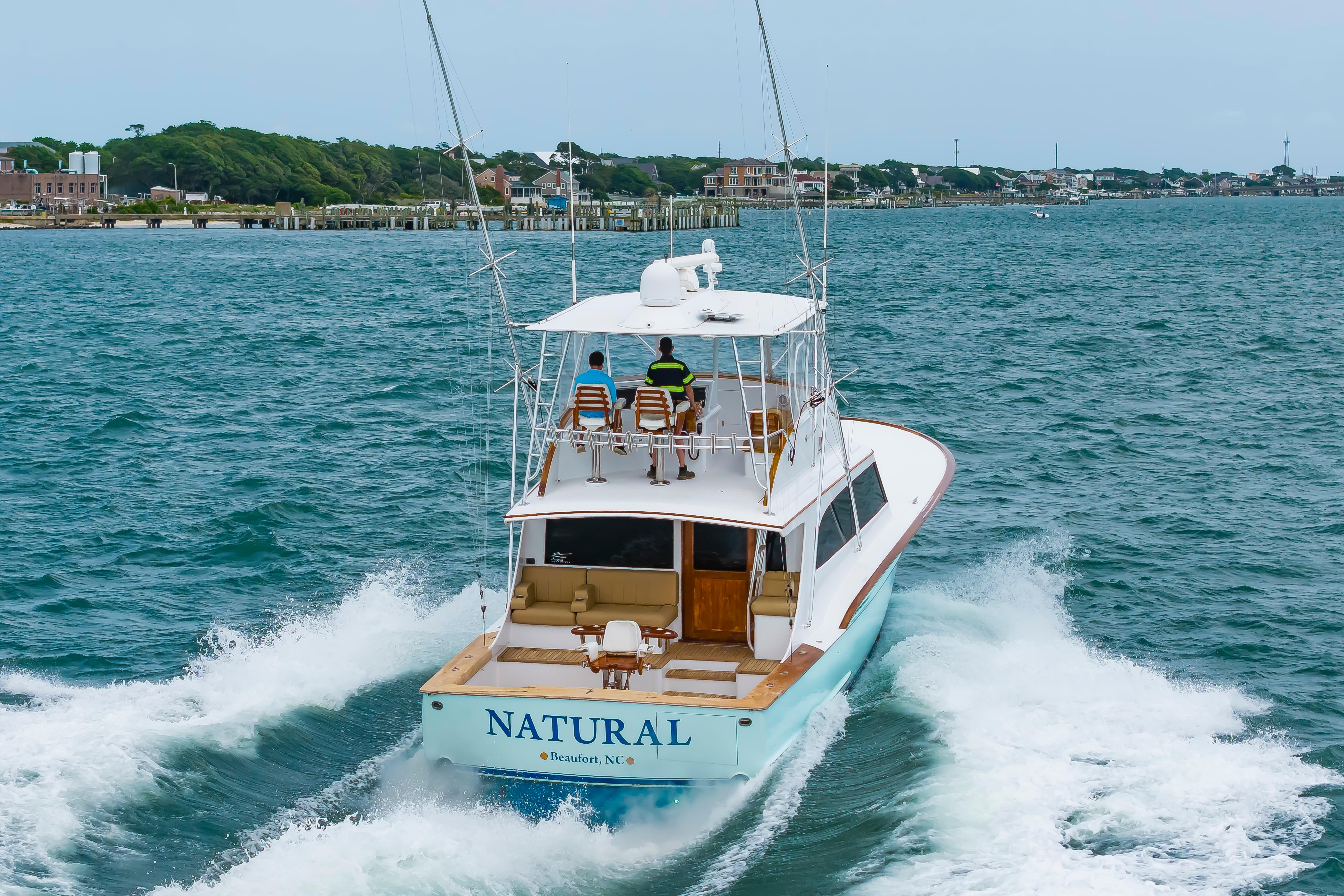 Custom Carolina Scarborough 56 Convertible yacht cruising near Beaufort, NC, 1993 model.