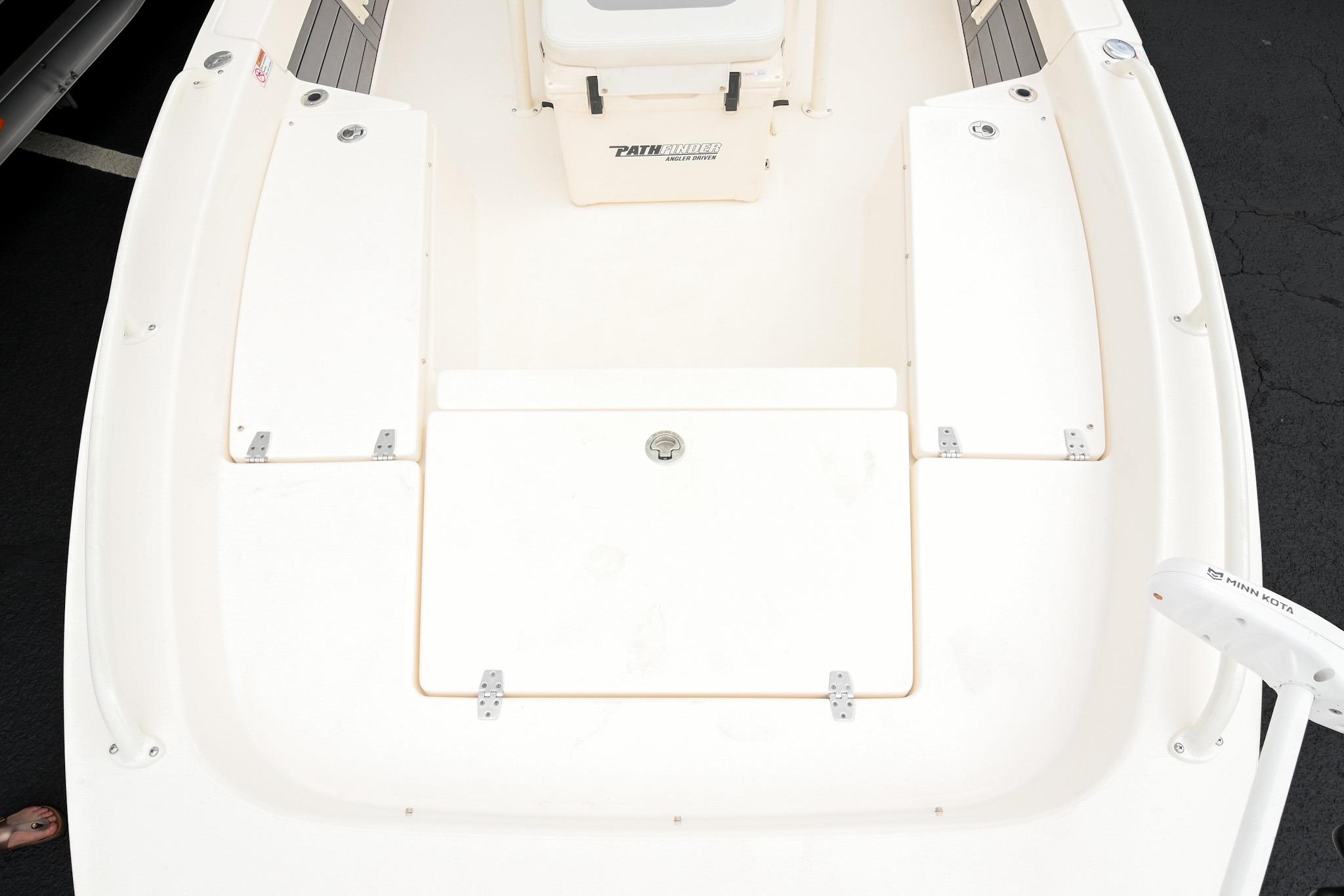 2021 Pathfinder 2200 TRS boat deck with storage compartments and Minn Kota trolling motor.