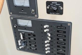 Control panel with switches and gauges.