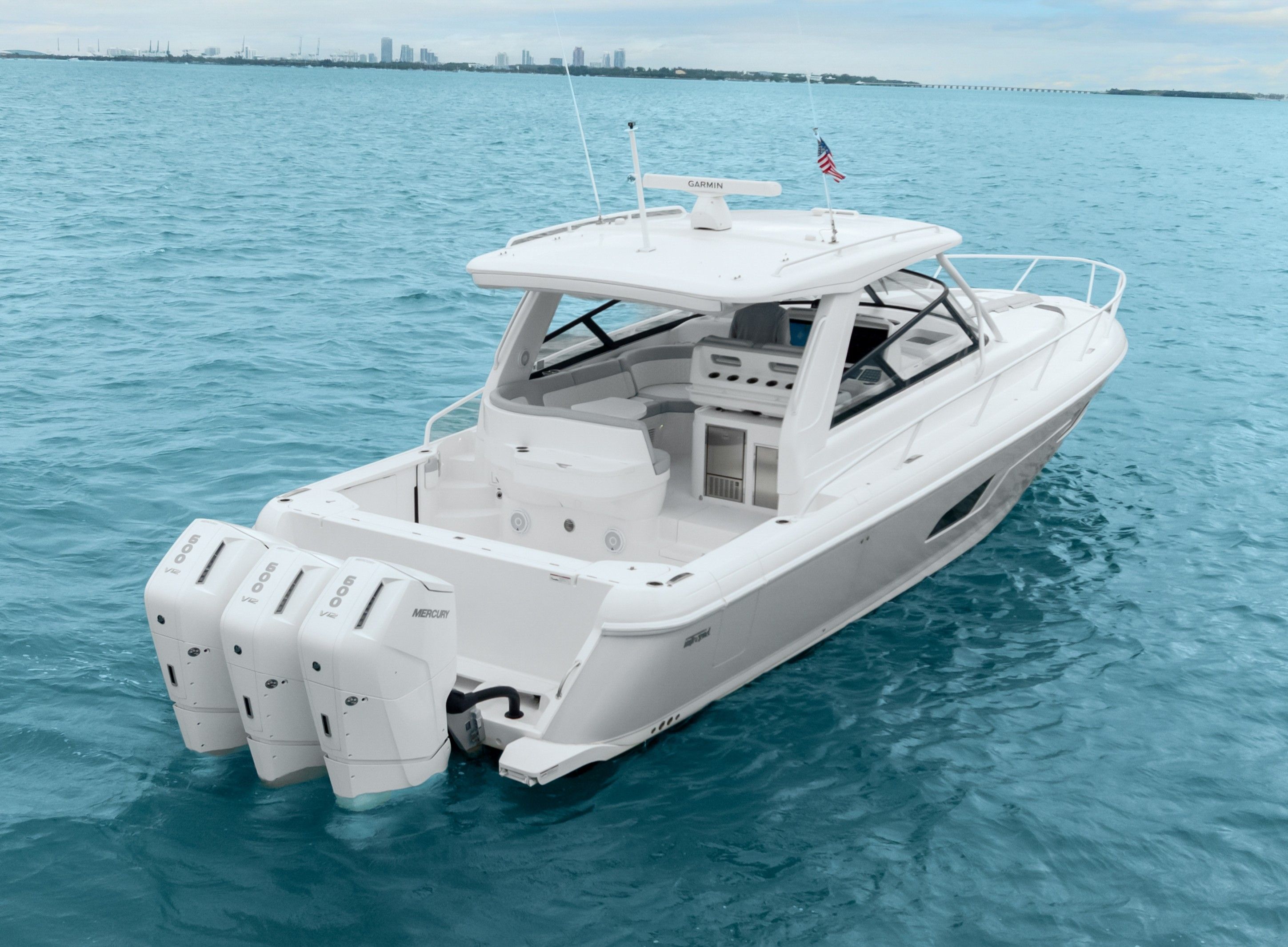 2024 Intrepid 477 Evolution boat on open sea.