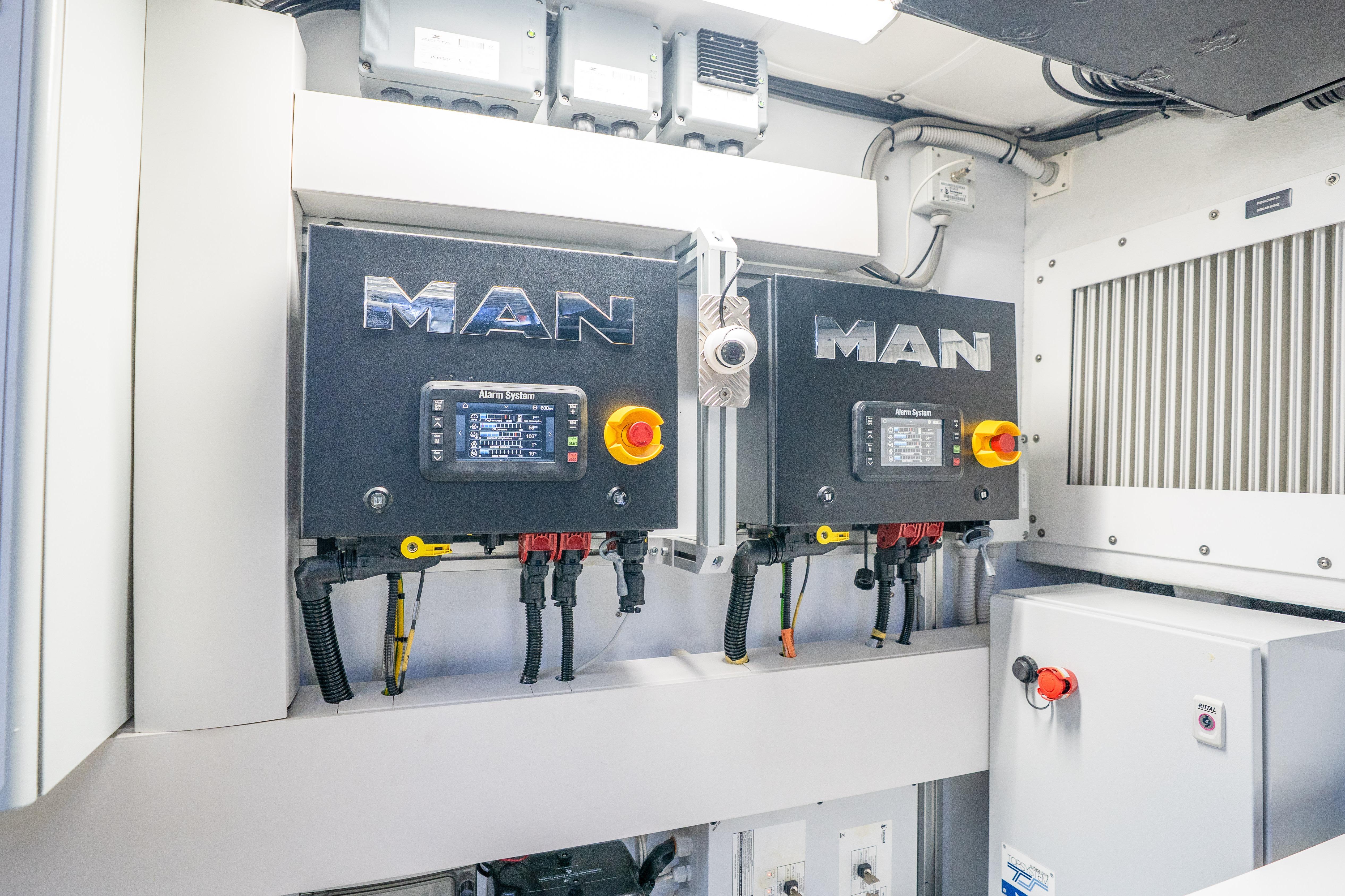 Engine room of 2024 Pershing 7X yacht featuring MAN control systems.