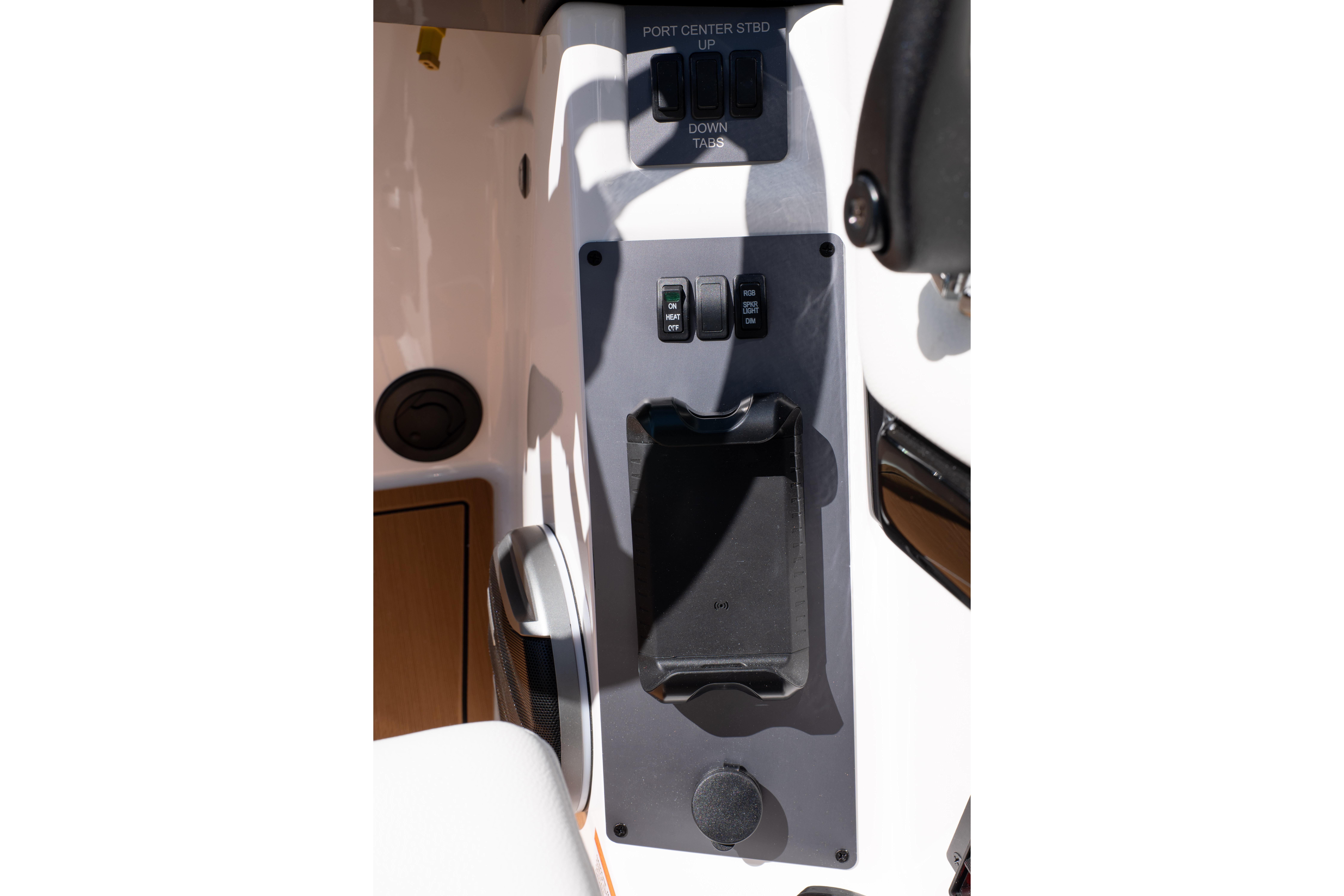2026 MasterCraft NXT24 boat control panel with switches and holder.