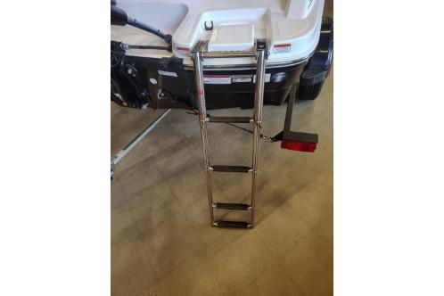 2026 Tahoe T16 boat with a foldable rear ladder on display.