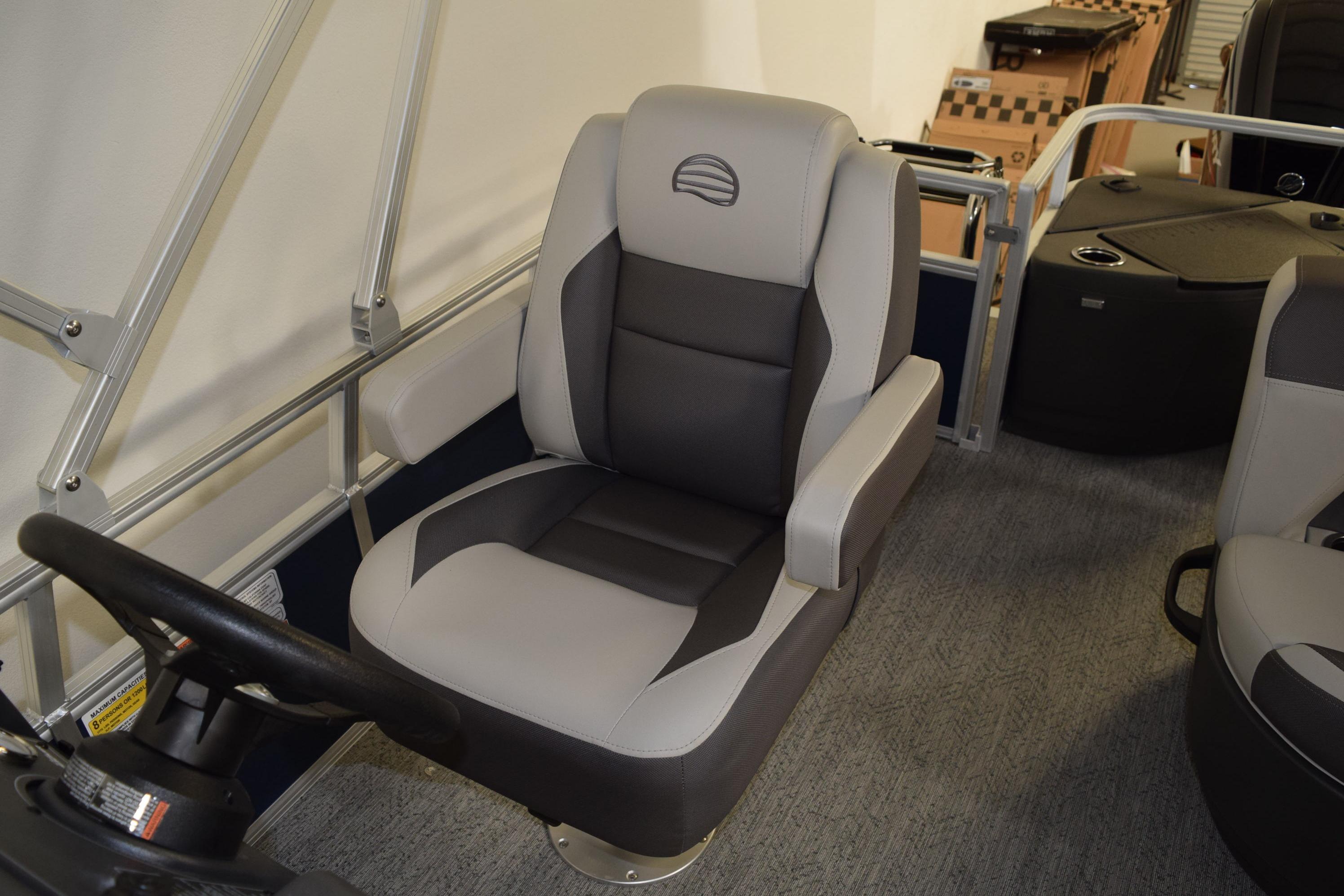 2026 Sun Tracker Bass Buggy 18 DLX boat interior with comfortable captain's chair.