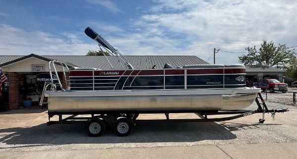 2024 Landau ATLANTIS 230C pontoon boat on trailer.