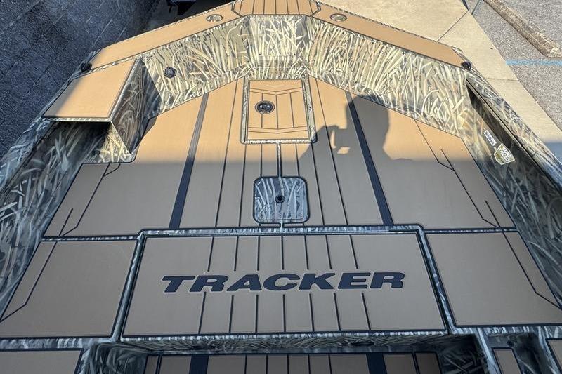 2026 Tracker Grizzly 1756 T Marsh boat deck with camouflage design and logo.