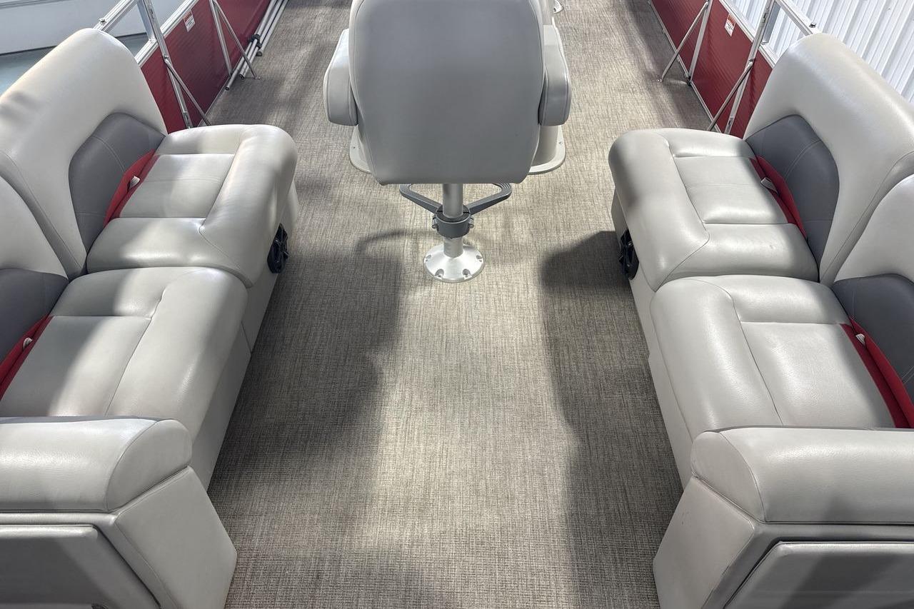 2022 Landau ALURE 232 boat interior with gray seating and red accents.