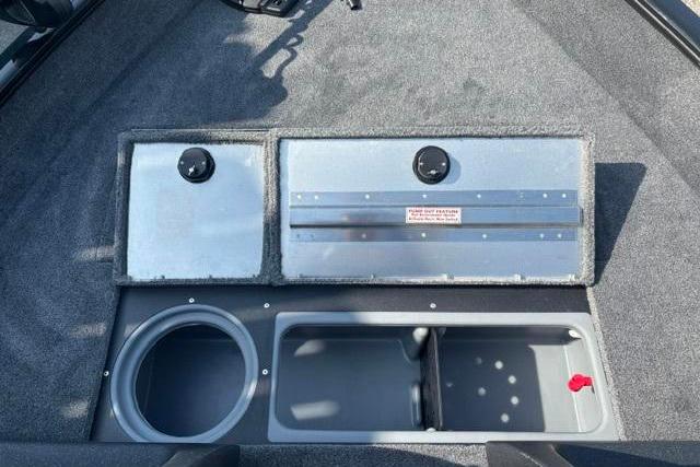 2026 Tracker Pro Guide V-16 WT boat storage compartments and cup holder.