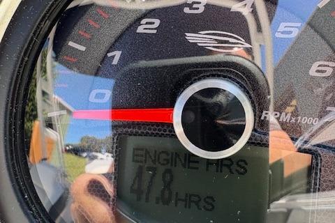 Close-up of 2023 Chaparral 21 SSi tachometer showing 478 engine hours.